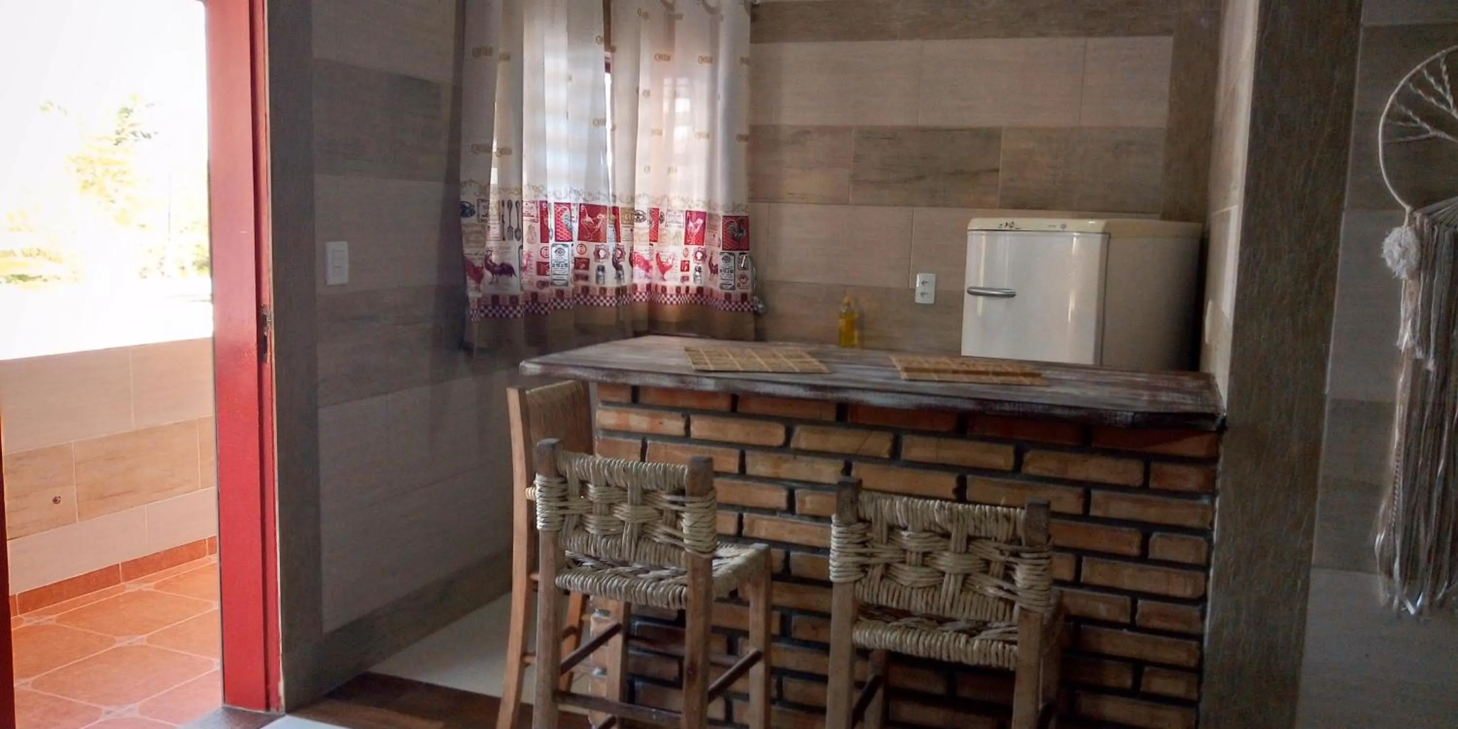 Kitchen or kitchenette in Hotel Ferrugem Eco Village