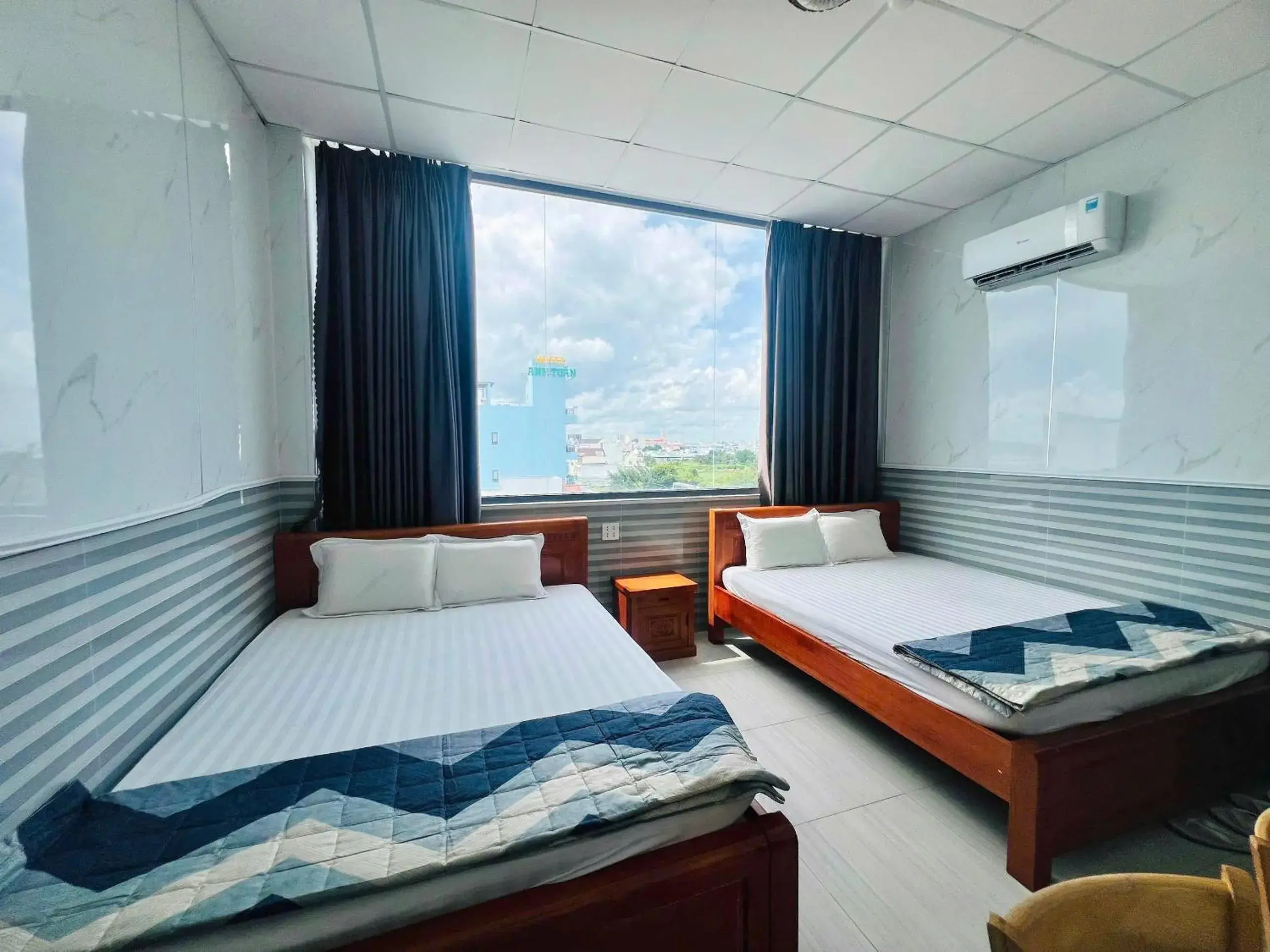 Deluxe Queen Room with Two Queen Beds in Hotel Sen Việt Bạc Liêu Deluxe Queen Room with Two Queen Beds in Hotel Sen Việt Bạc Liêu