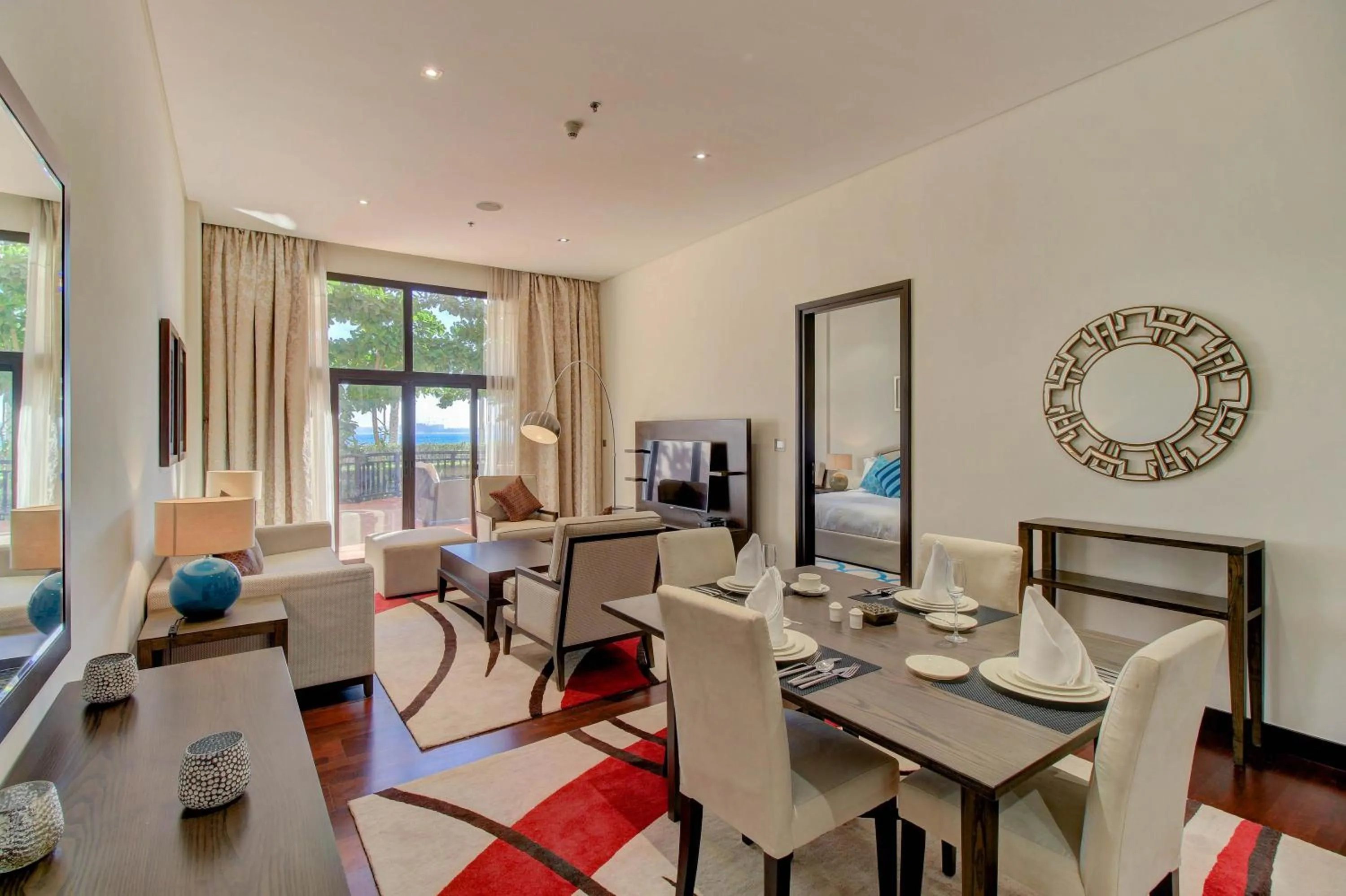 TV and multimedia in Luxe Getaways Royal Amwaj Palm Jumeirah Resort Apartment Holiday Home