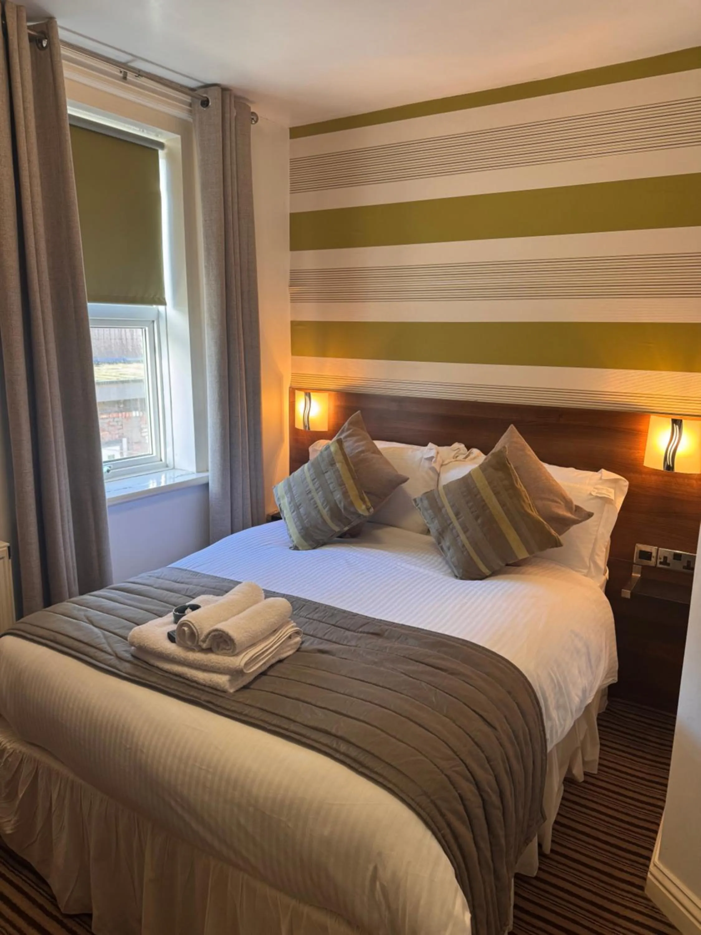 Bed in Delovely Hotel