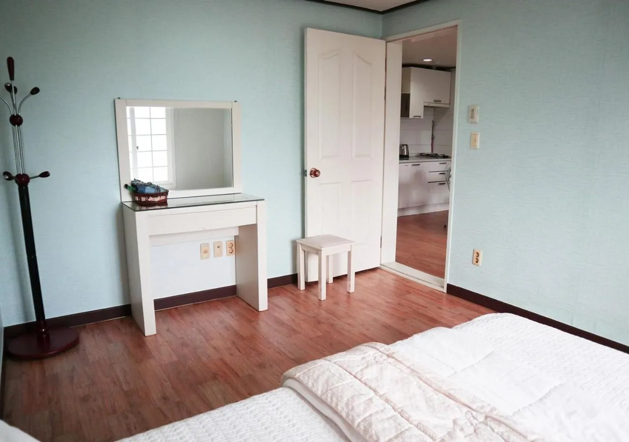 Bed in Jeju Resortel