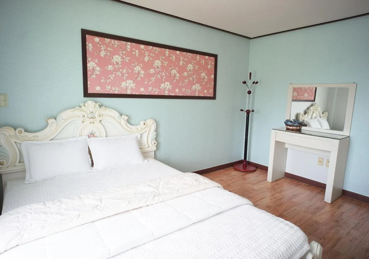 Bed in Jeju Resortel