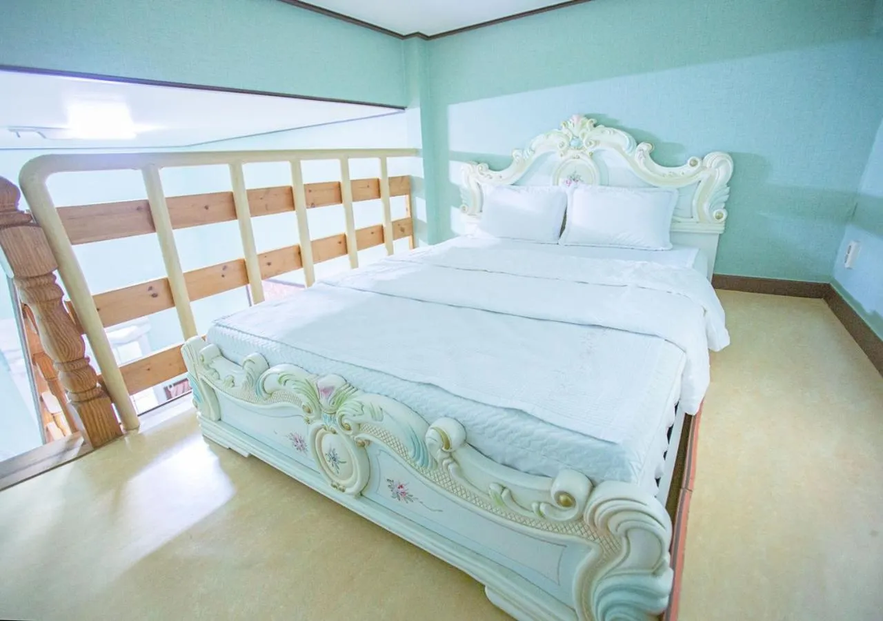 Bed in Jeju Resortel