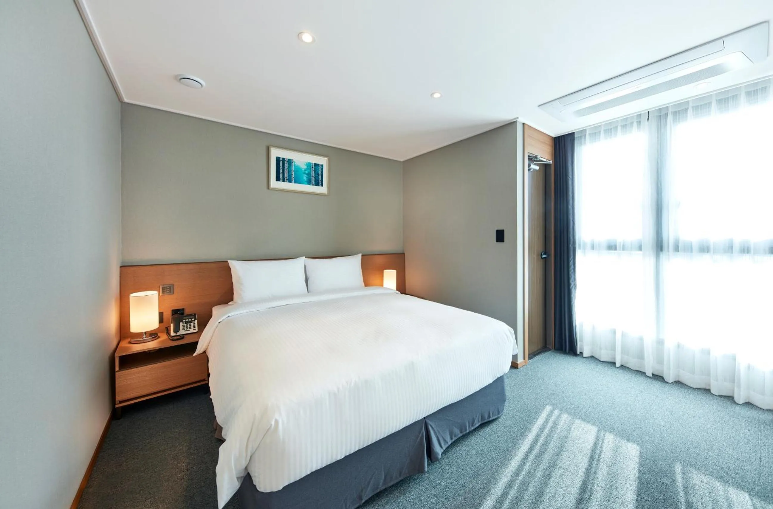 Bed in Ramada by Wyndham Gumi