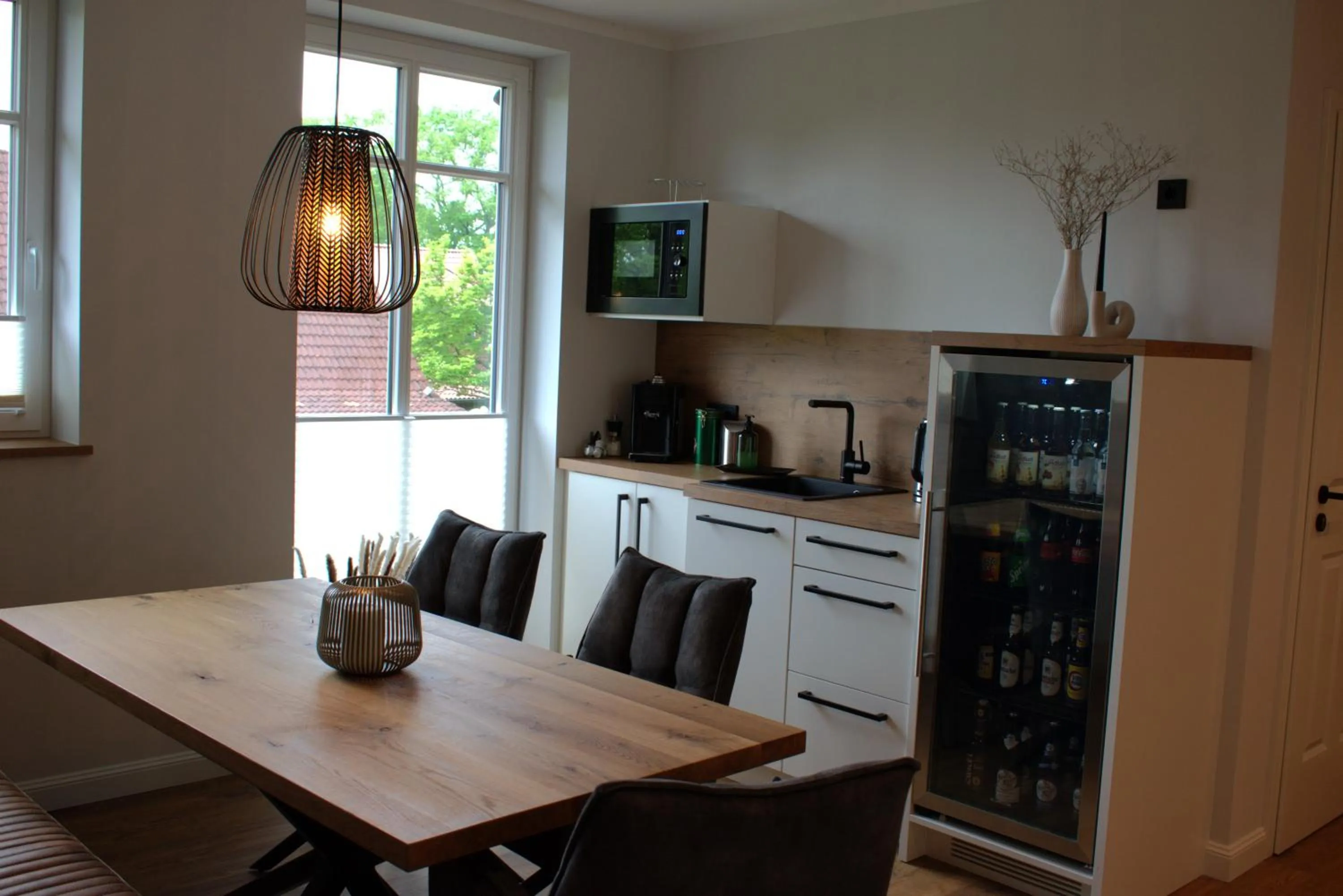 Seating area in DZ/EZ Lodberger Scheunencafe