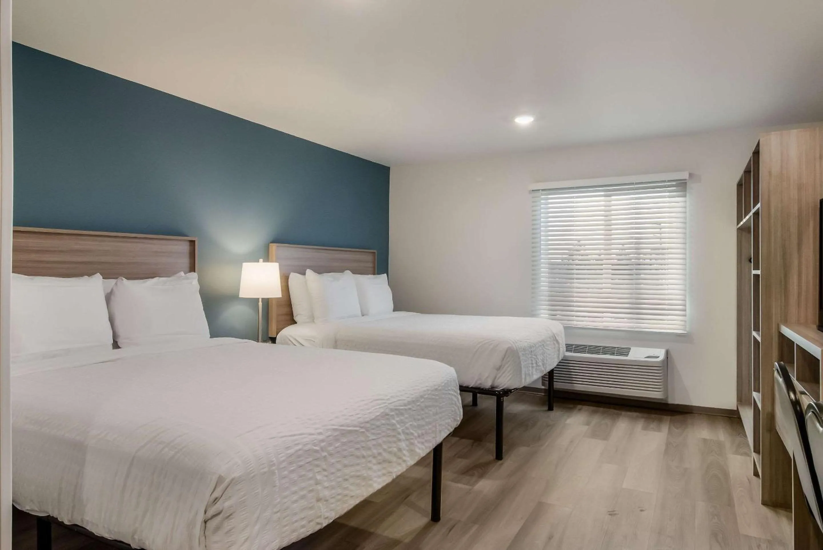 Photo of the whole room, Bed in WoodSpring Suites Tacoma - Lakewood