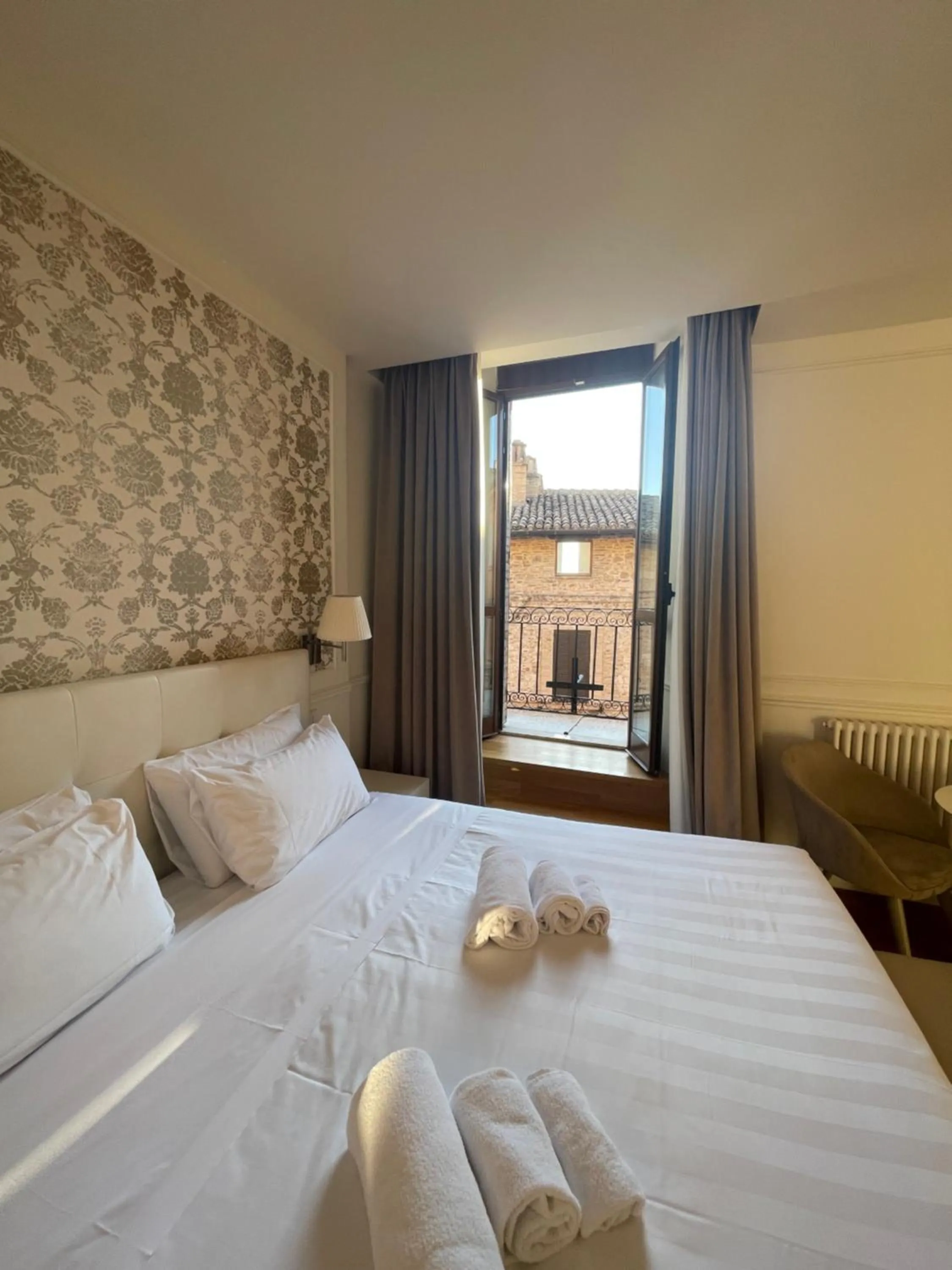 Bed in Asisium Boutique Hotel