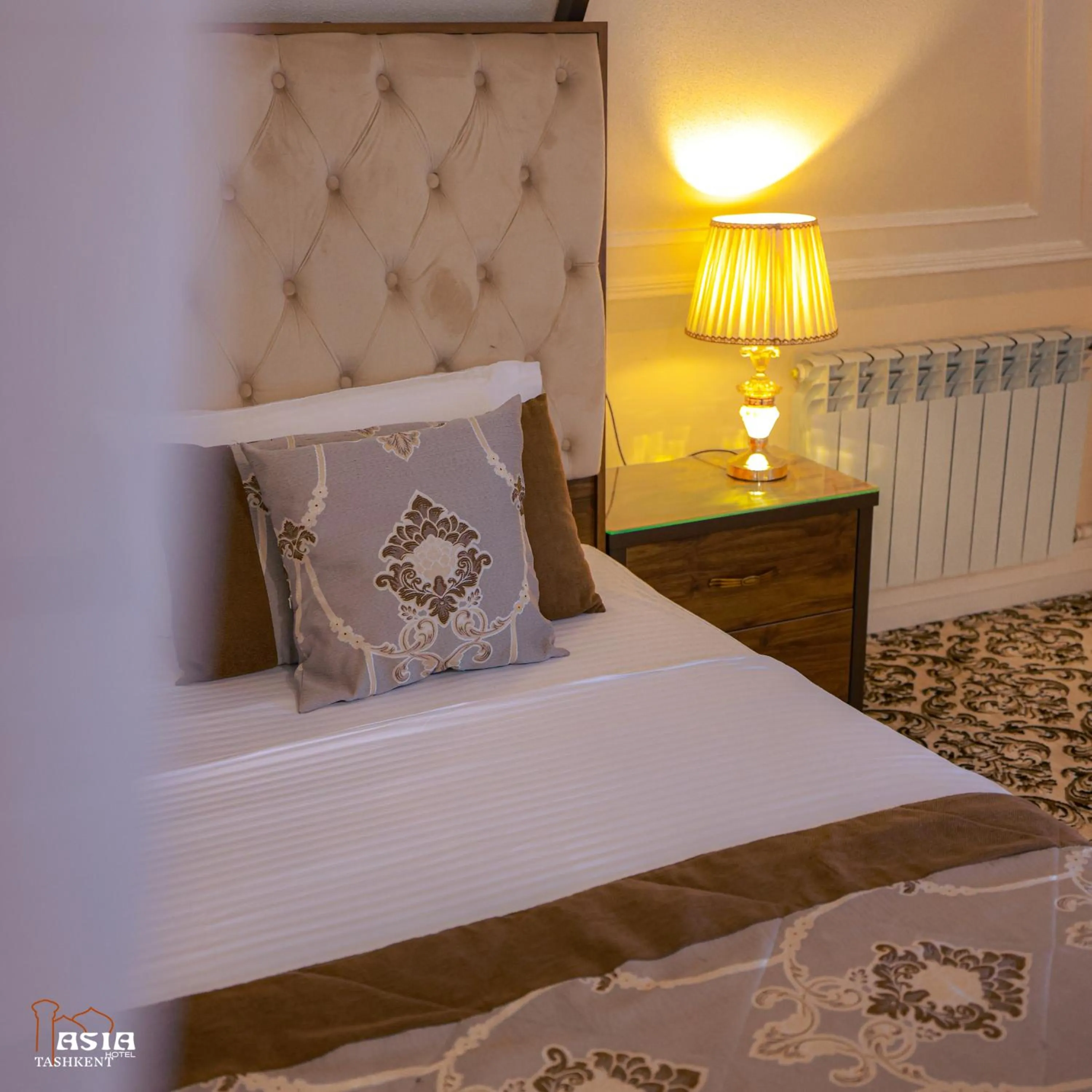 Bed in Asia Tashkent Hotel