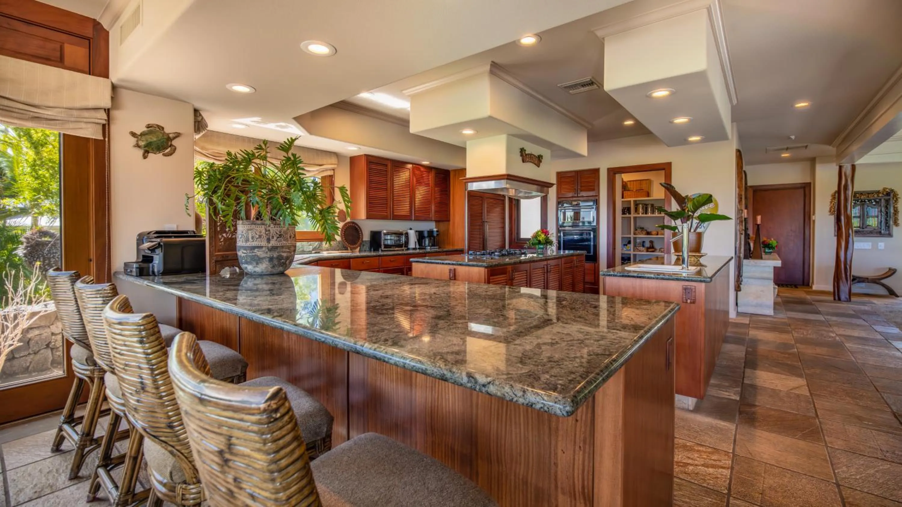 Kitchen or kitchenette in Mauna Lani Luxury Vacation Villas - CoralTree Residence Collection