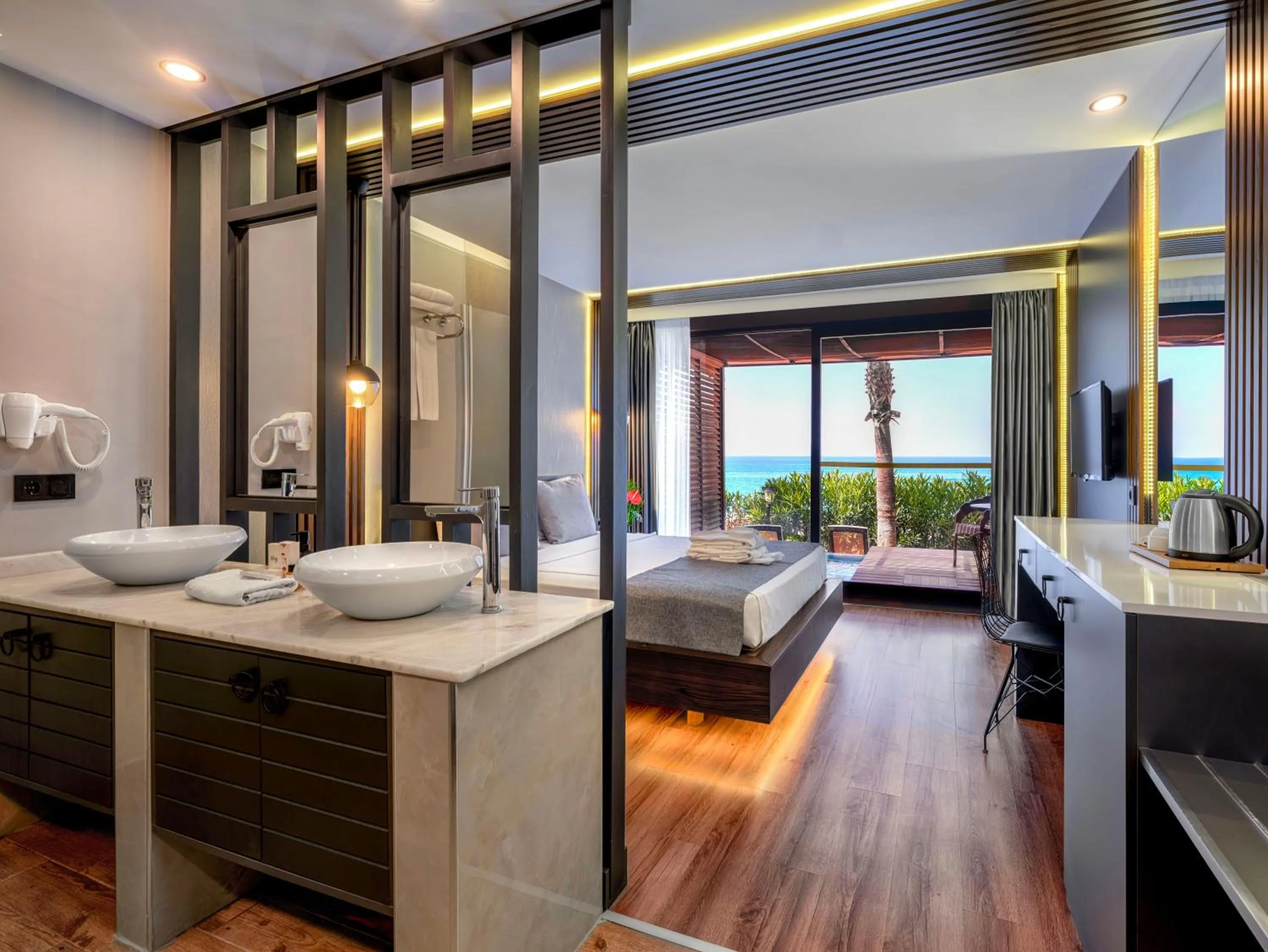 Communal lounge/ TV room, Bed in Adora Calma Beach Hotel Adults Only