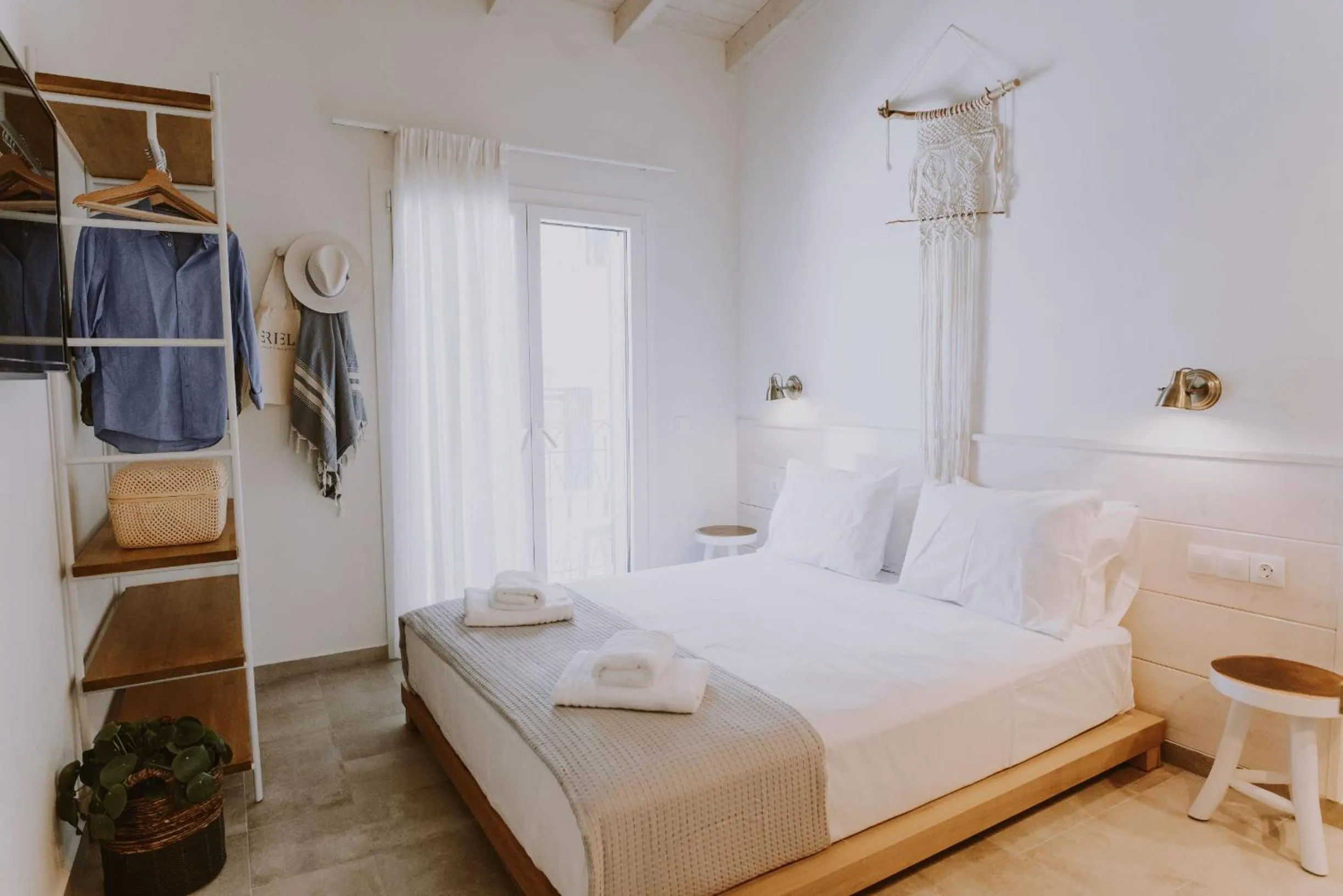 Bed in ERIEL Boutique Apartments