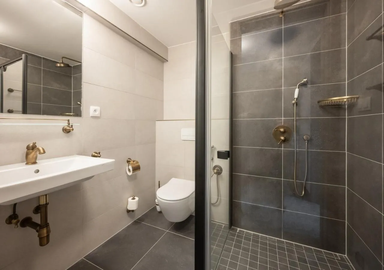 Shower in EFI SPA Hotel Superior & Pivovar