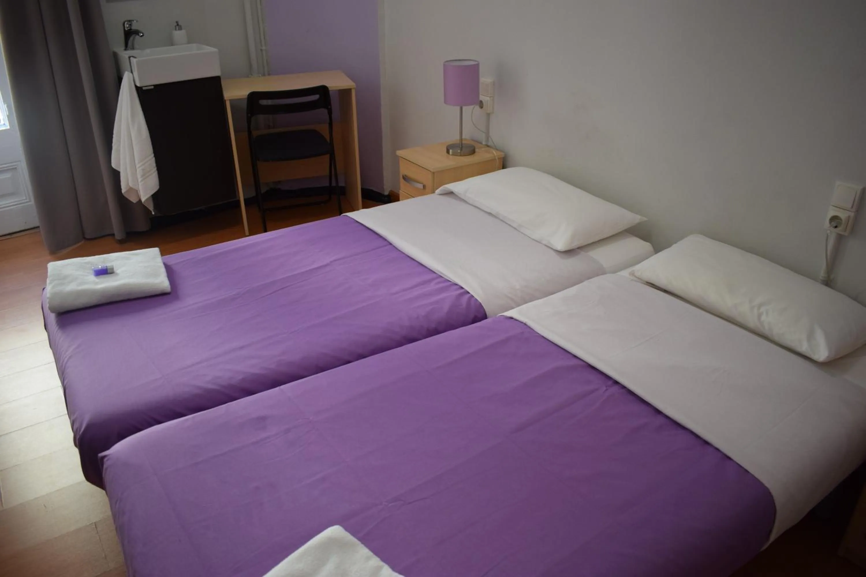 Photo of the whole room, Bed in Hostal MiMi Las Ramblas