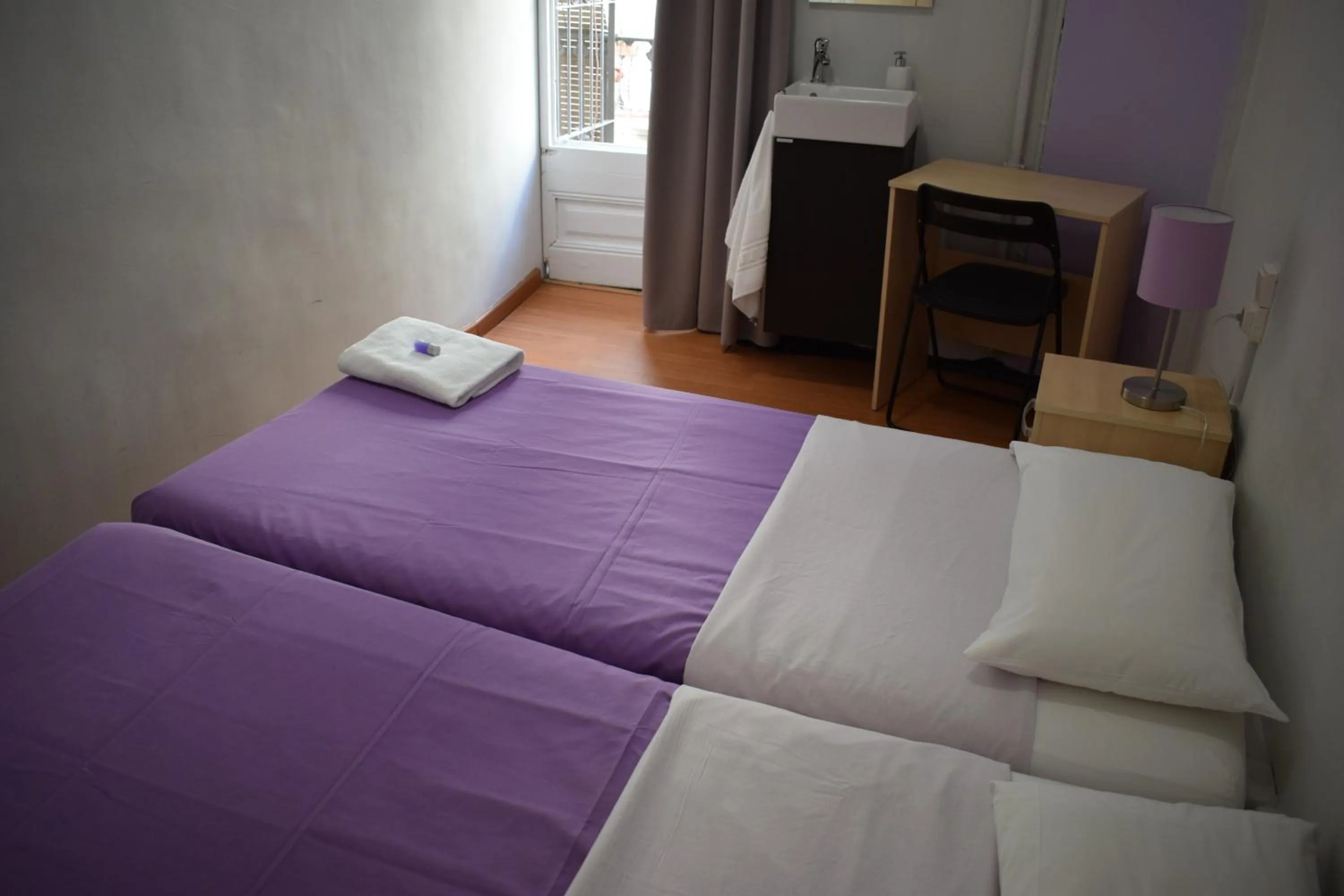 Photo of the whole room, Bed in Hostal MiMi Las Ramblas