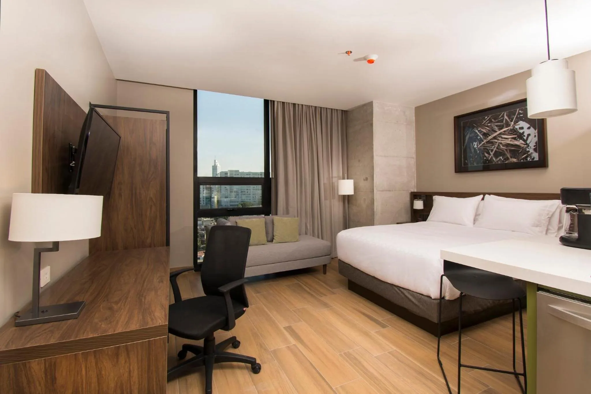 Photo of the whole room, Bed in Staybridge Suites - Guadalajara Novena by IHG