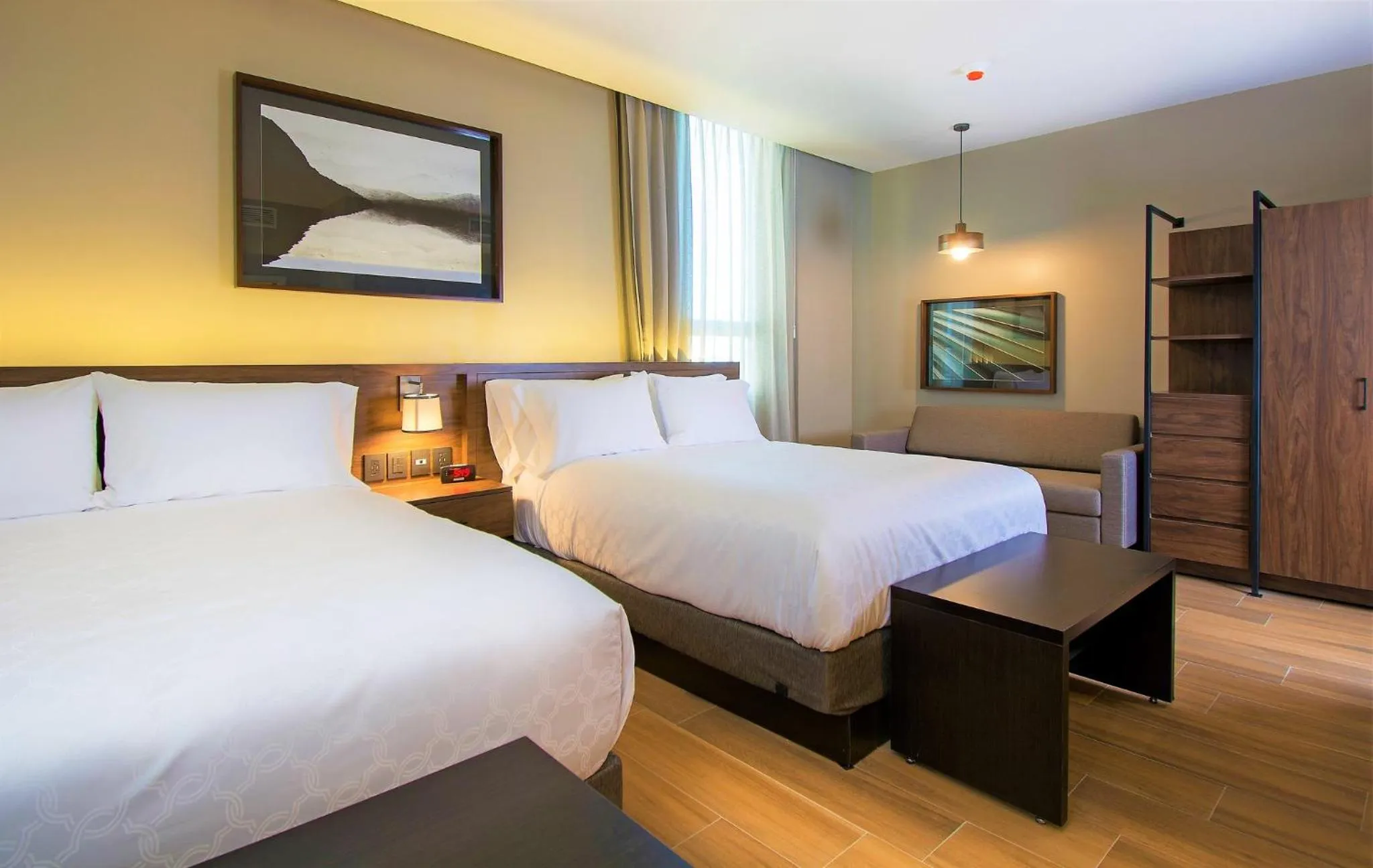 Photo of the whole room, Bed in Staybridge Suites - Guadalajara Novena by IHG