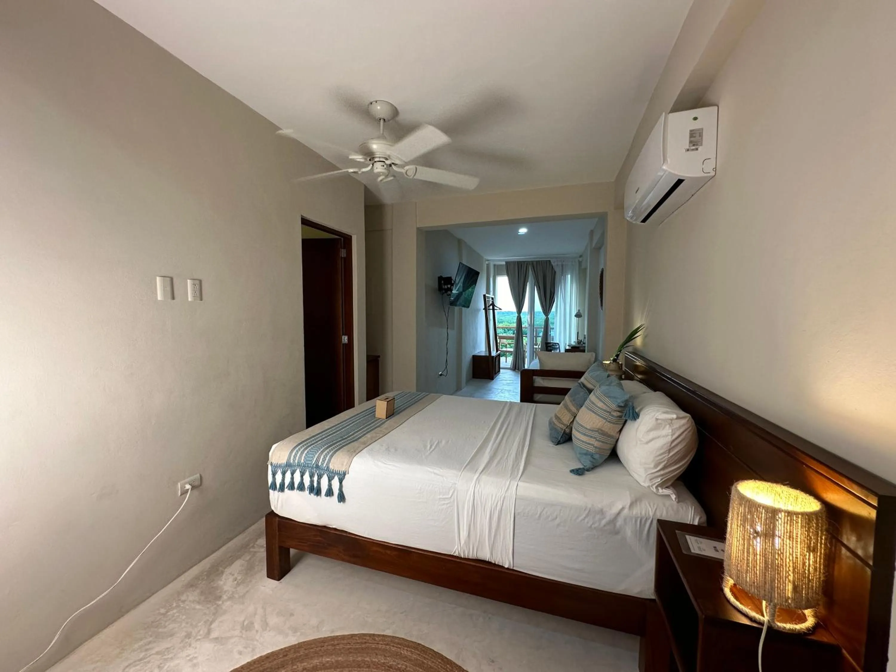 Bed in Noah Beach Hotel & Suites