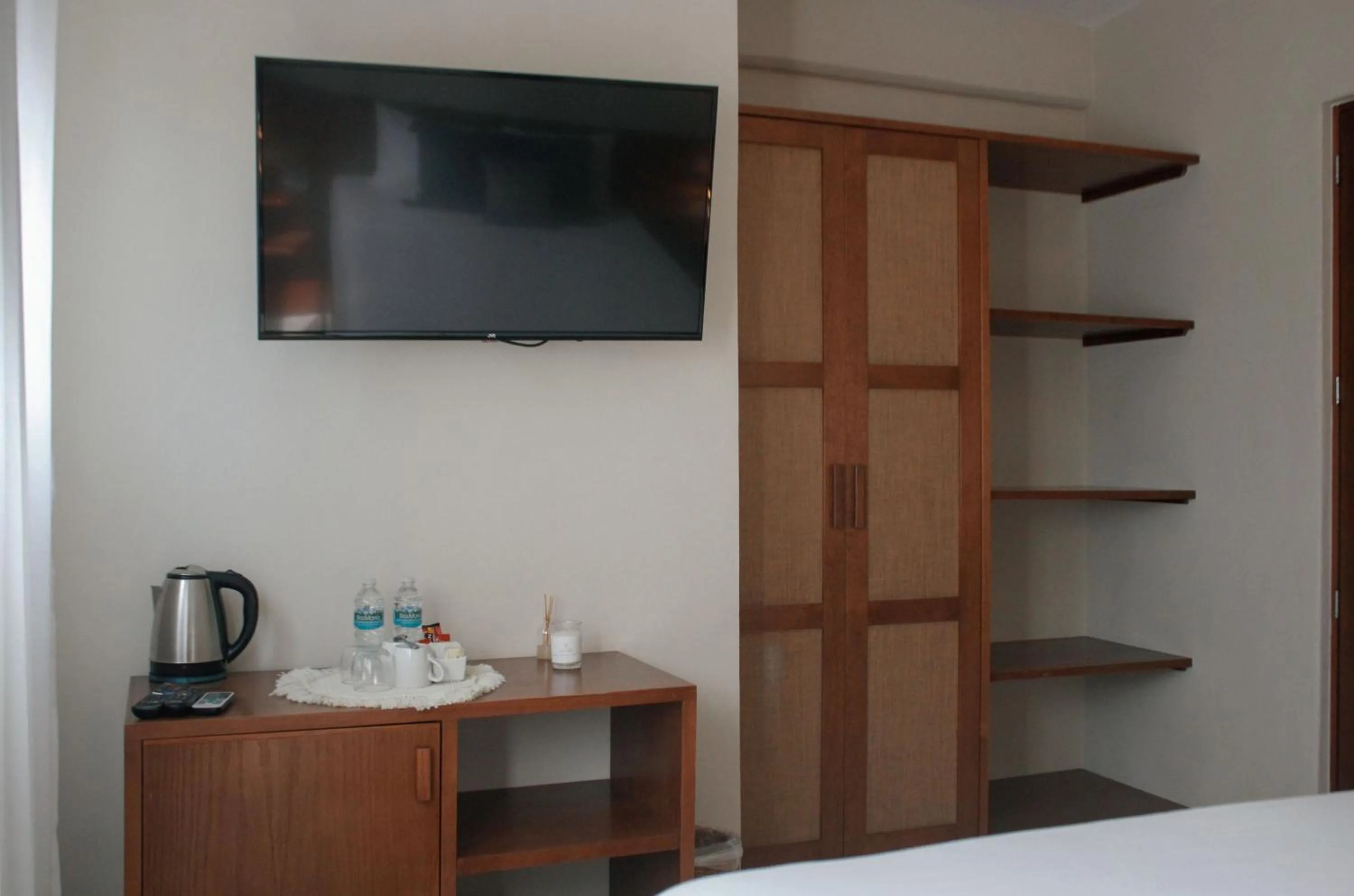 wardrobe, Bed in Noah Beach Hotel & Suites