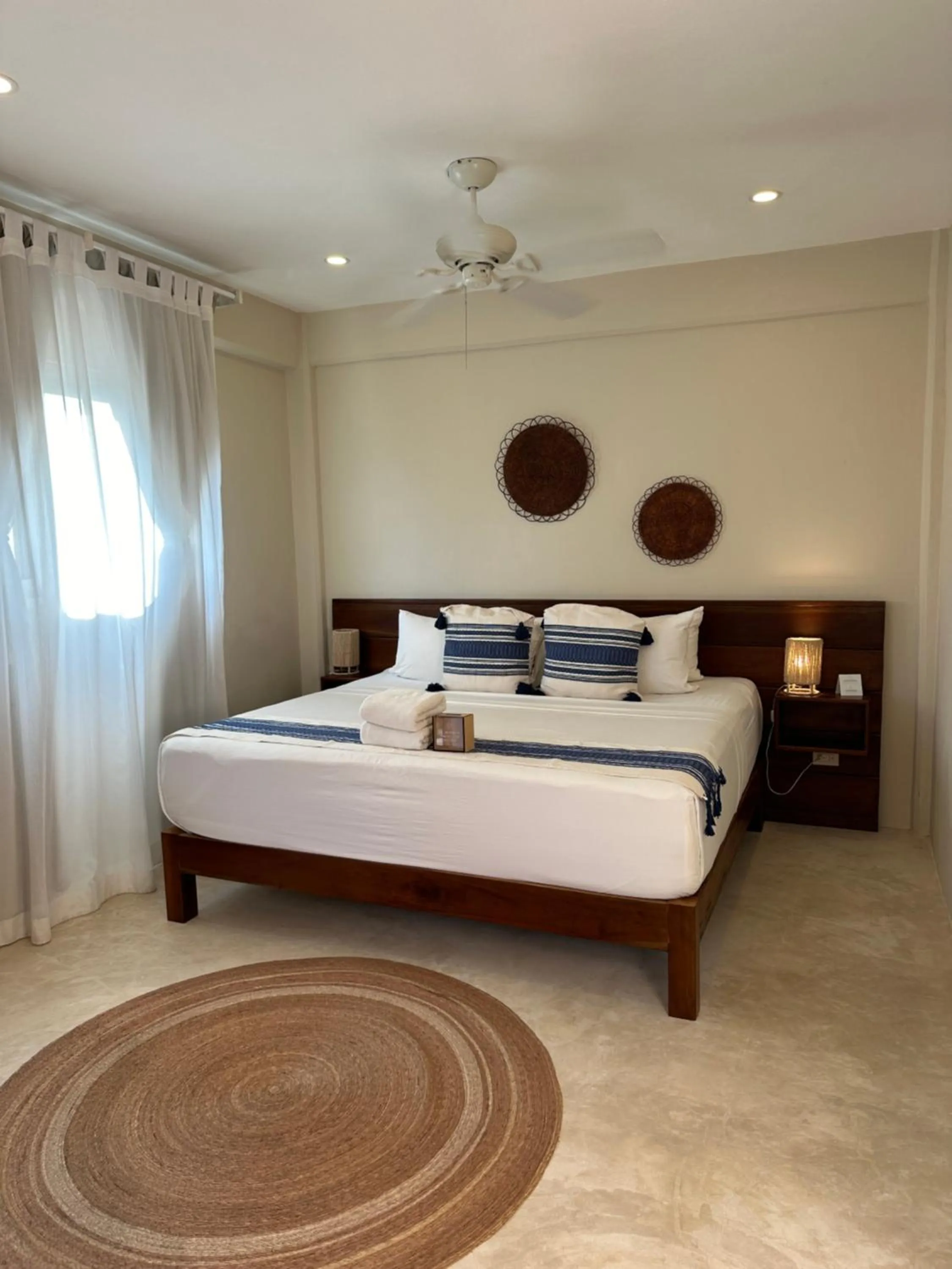 Bed in Noah Beach Hotel & Suites