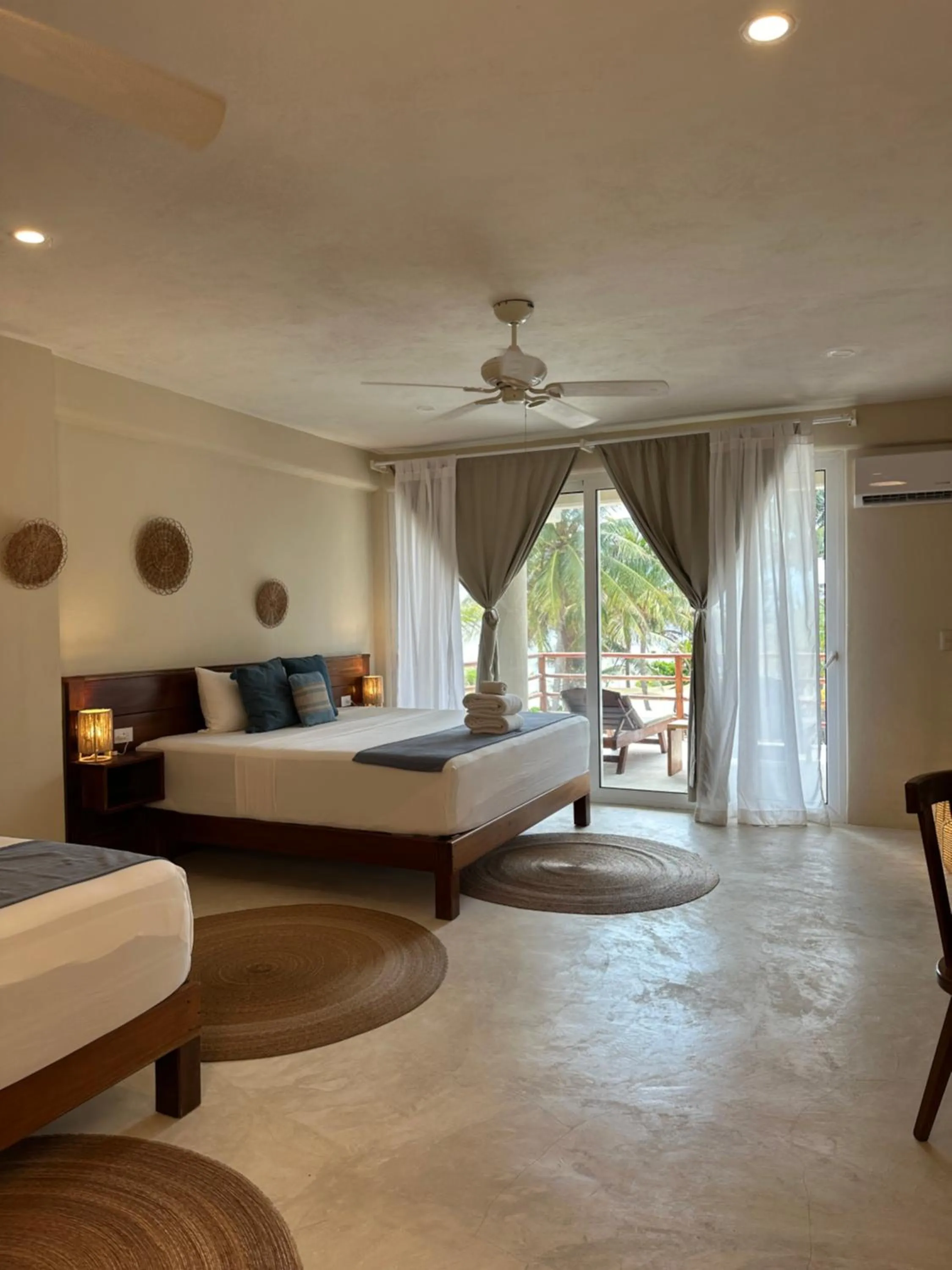 Bed in Noah Beach Hotel & Suites