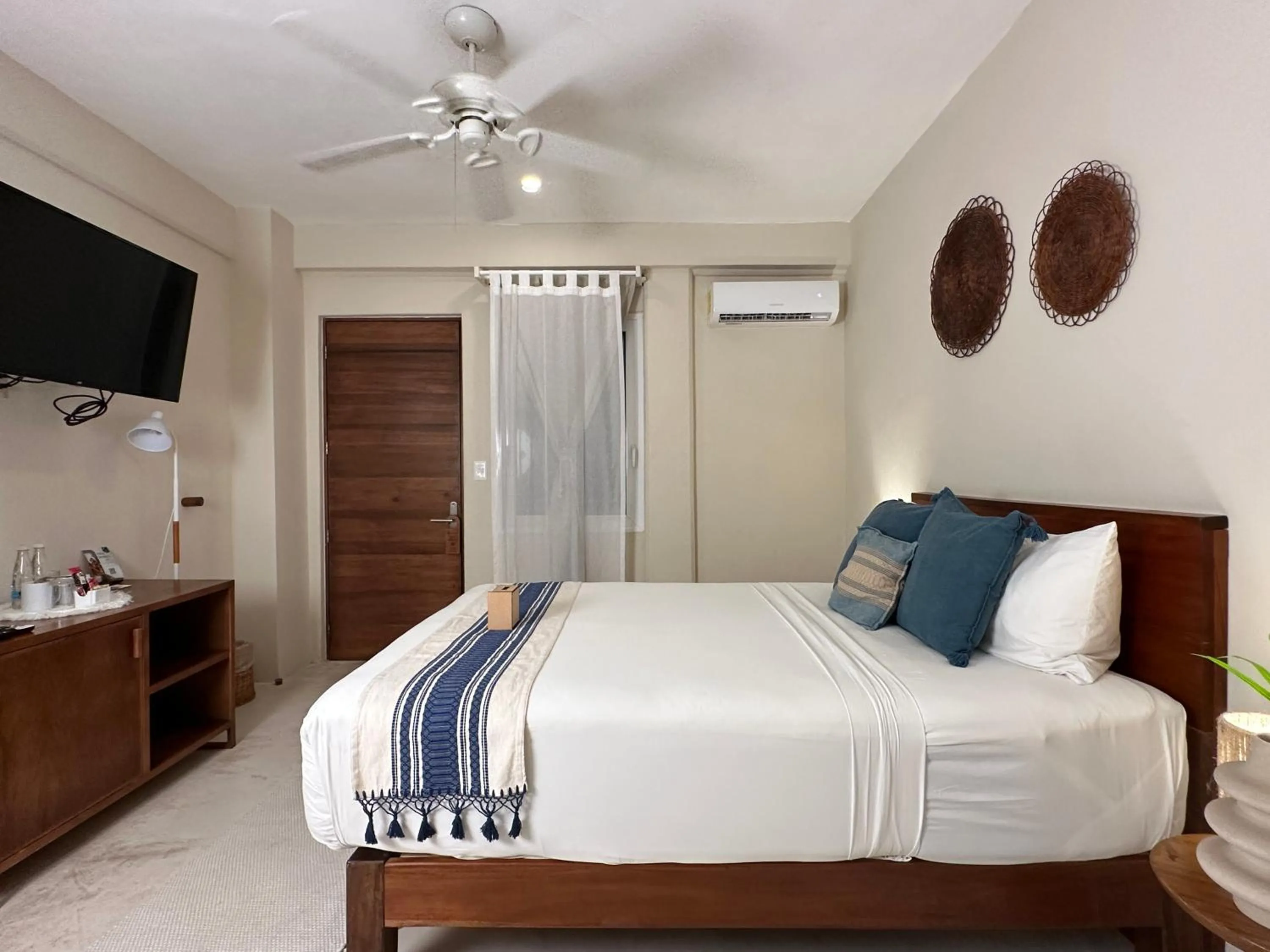 Bed in Noah Beach Hotel & Suites