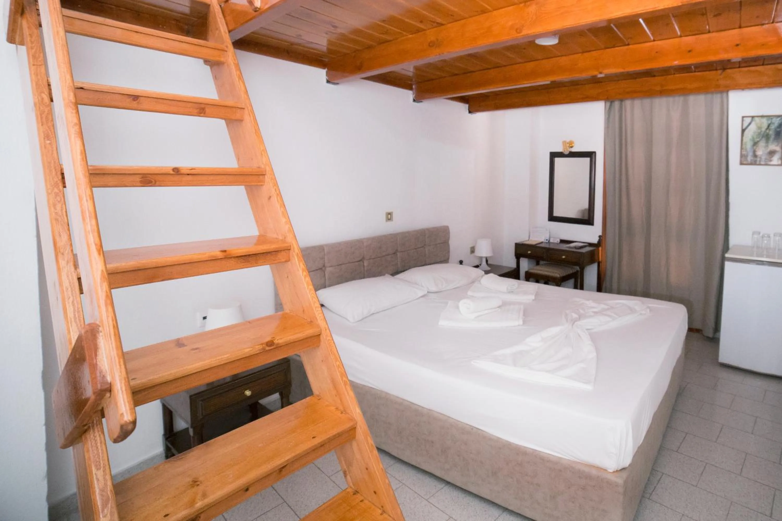 Bed in Κastro Ηotel