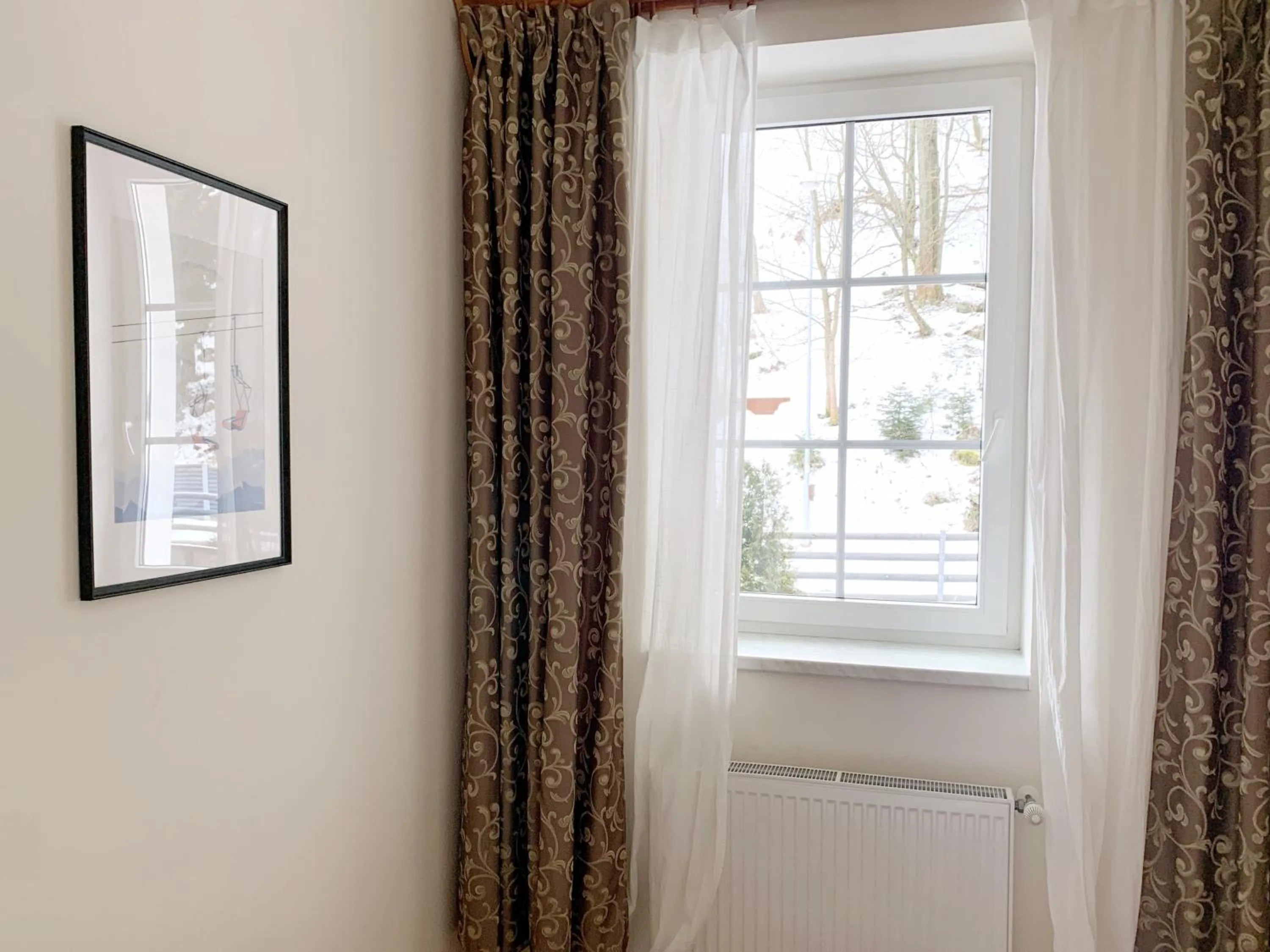 Communal lounge/ TV room in Hotel Hvezda