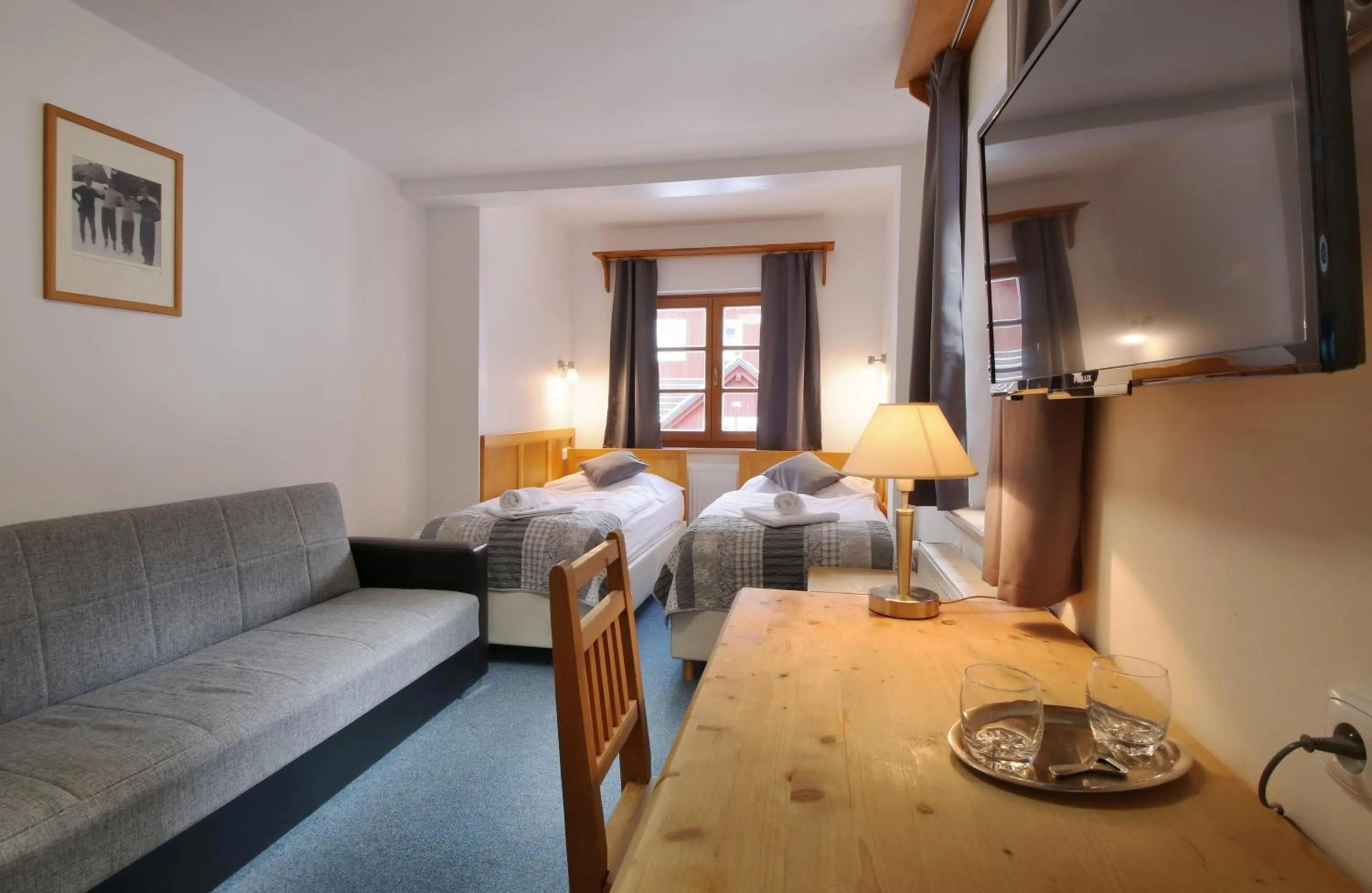 Seating area, Bed in Hotel Hvezda