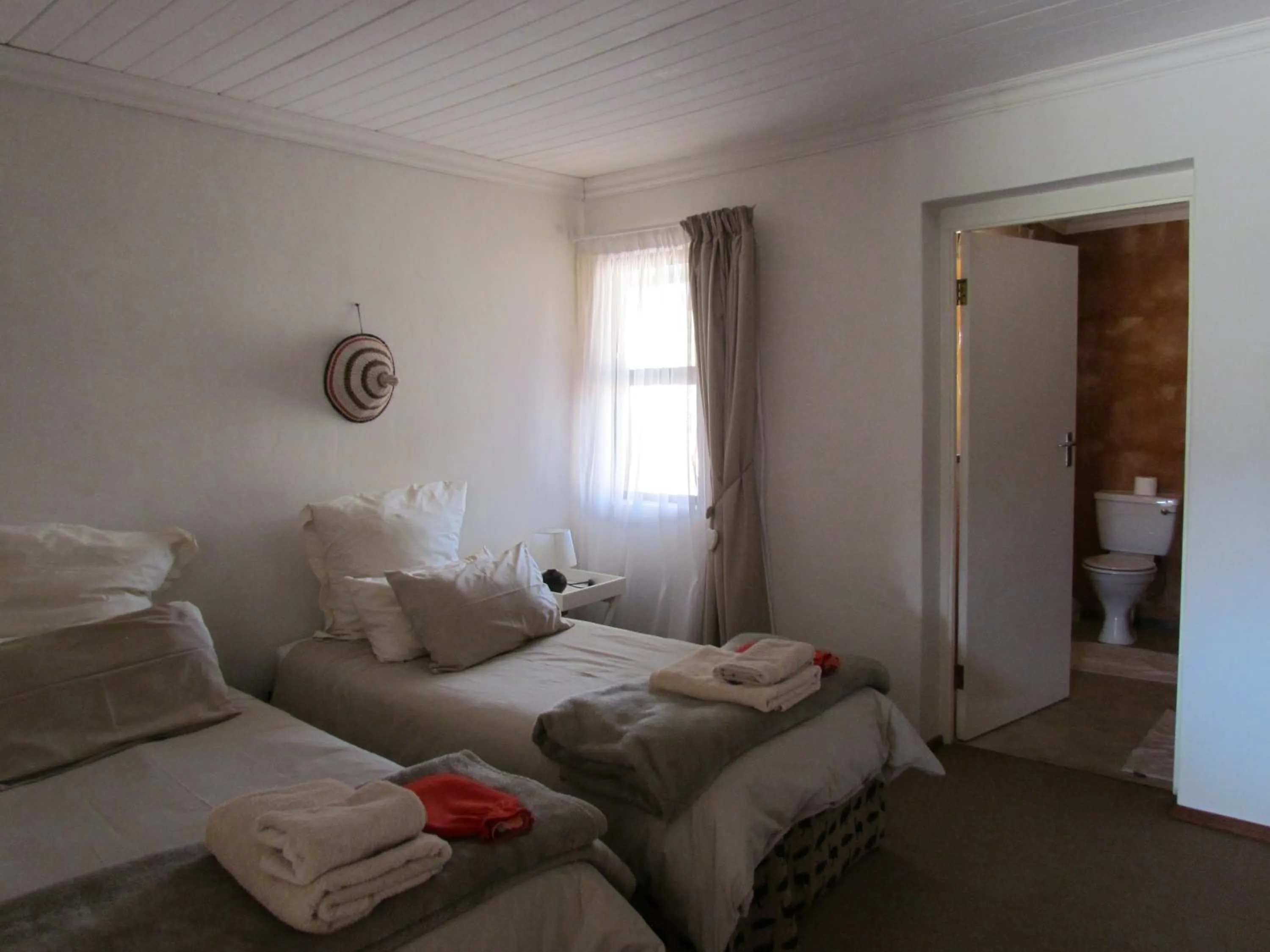 Bathroom, Bed in Pumula Guest Farm