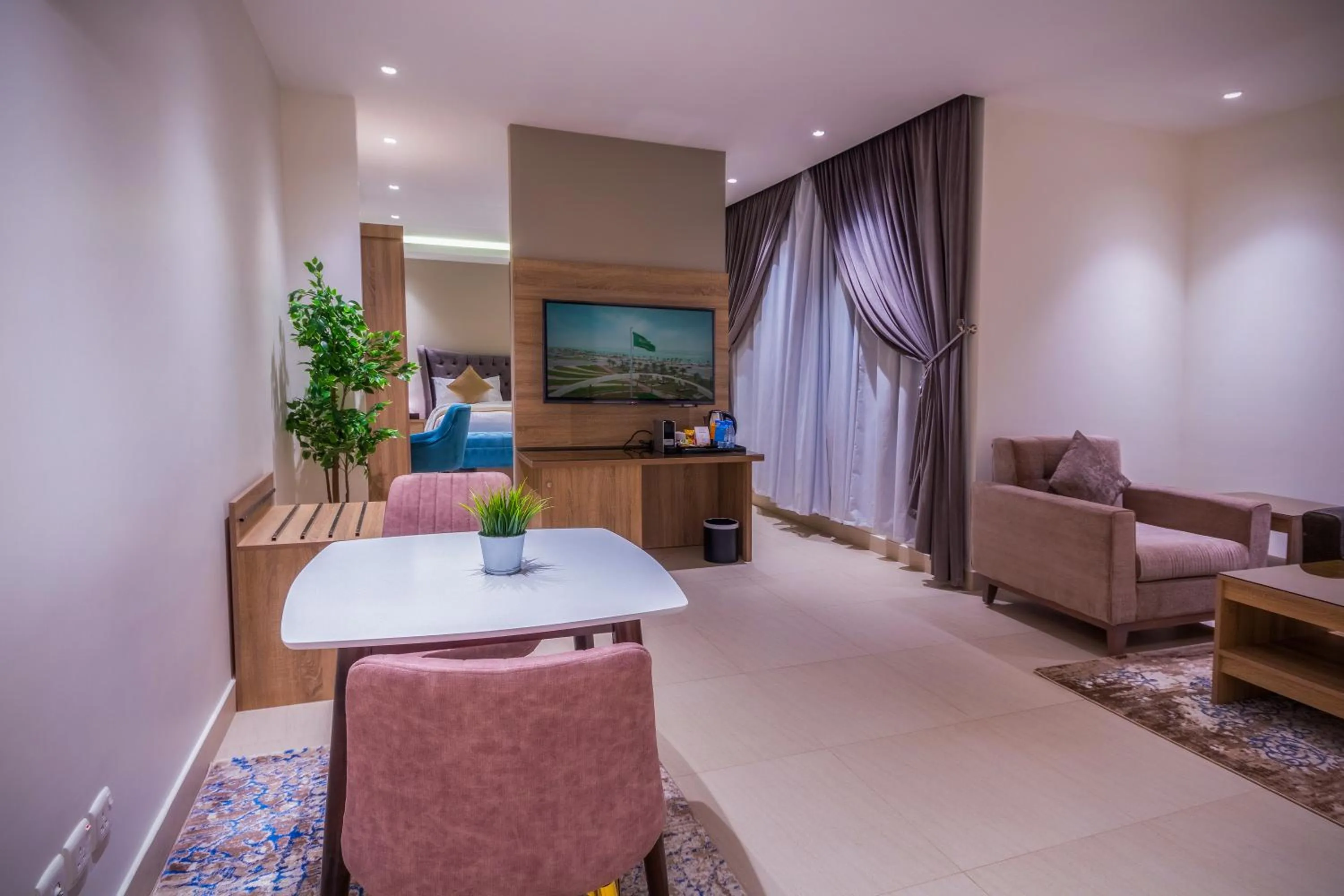 Communal lounge/ TV room in The Address Palace Apartments