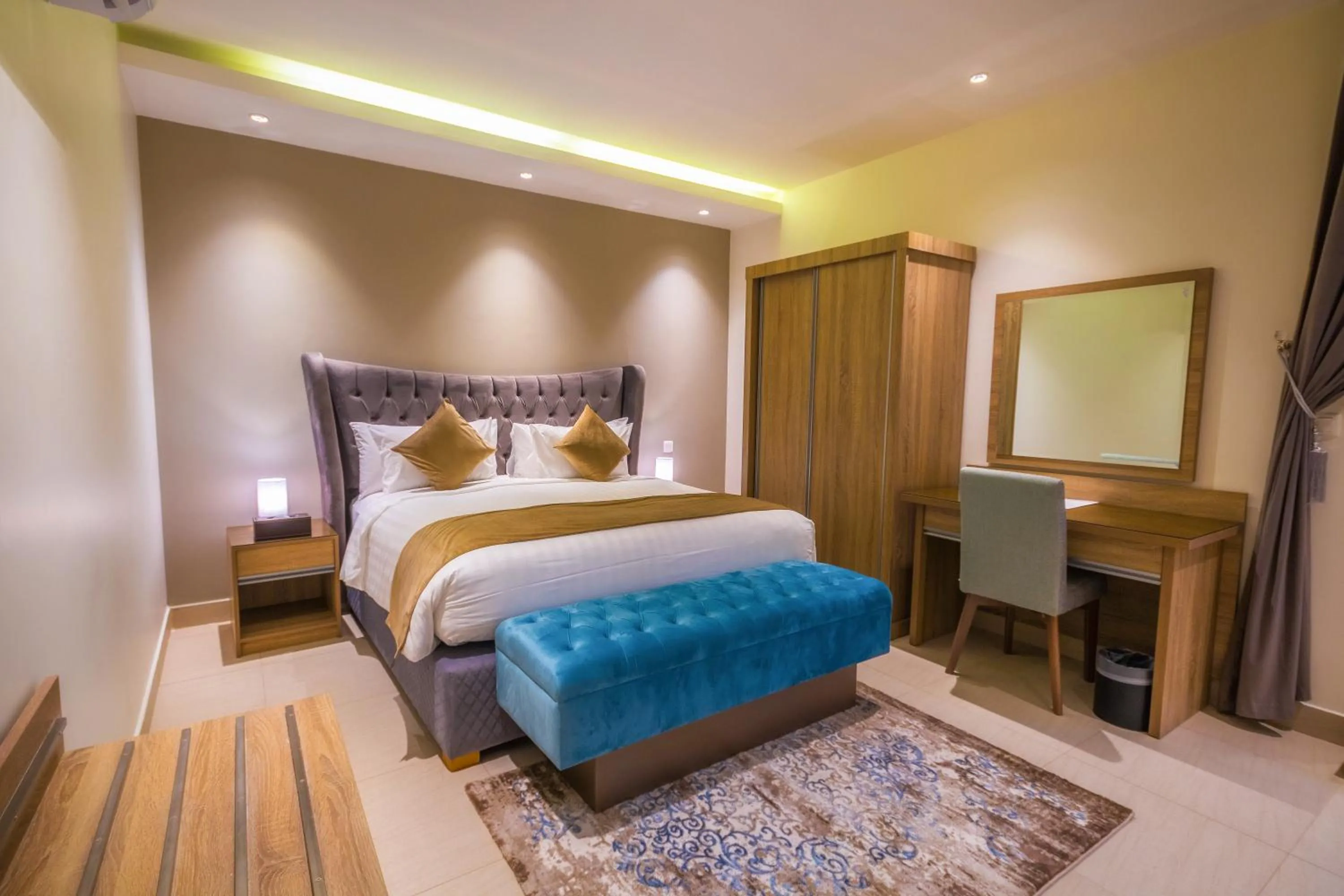 Bed in The Address Palace Apartments