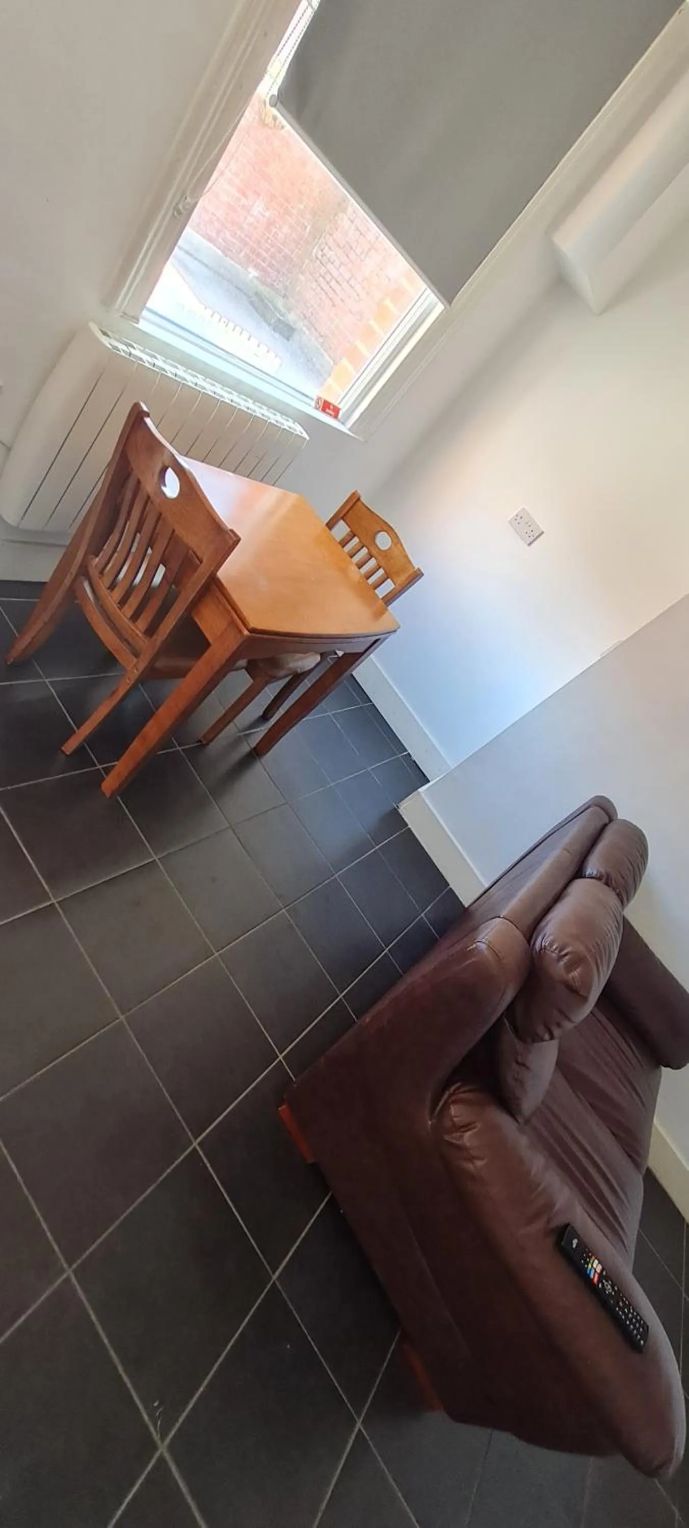 Kitchen or kitchenette in H.V Apartments