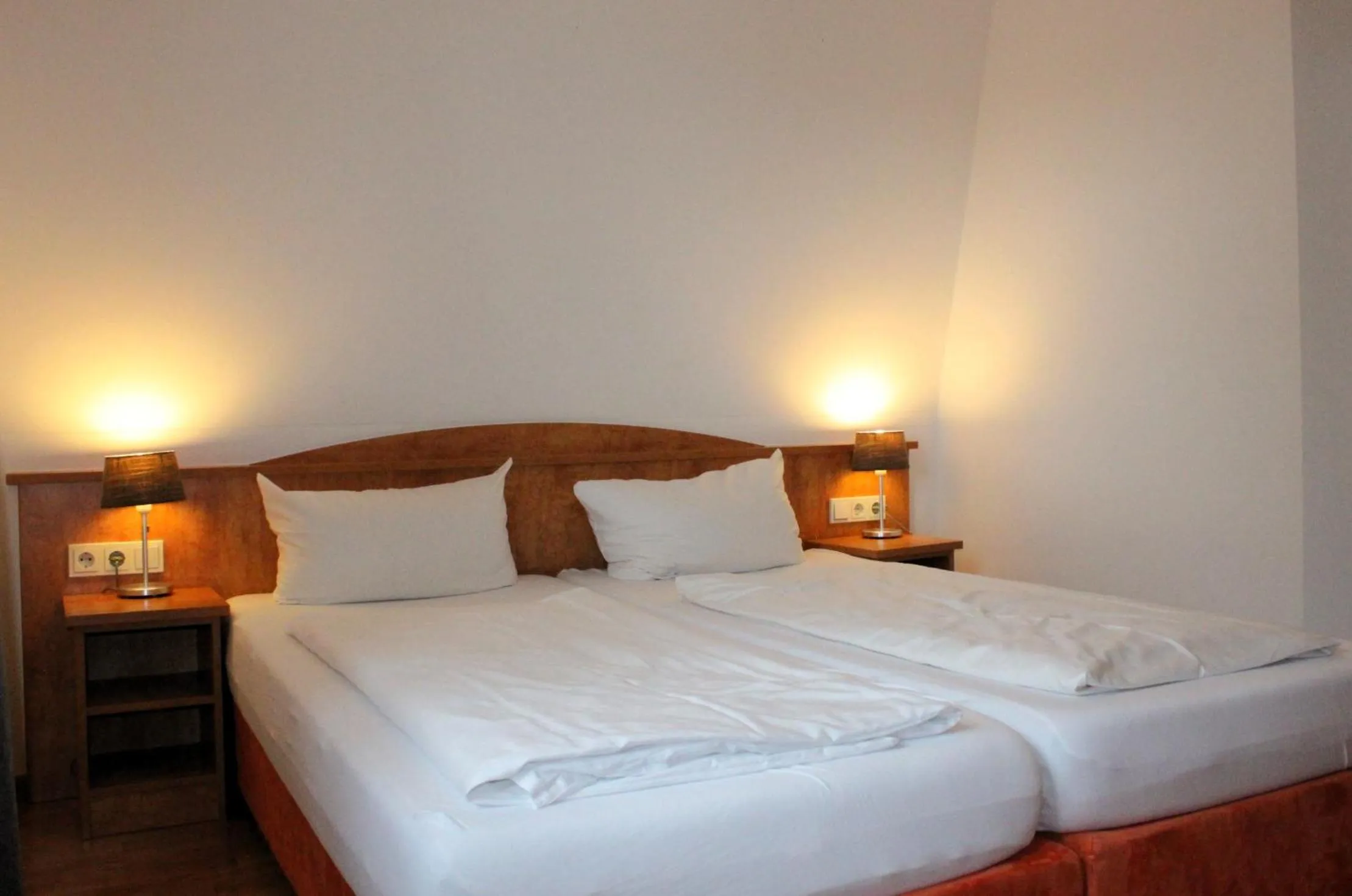 Bed in Hotel Waitzingers