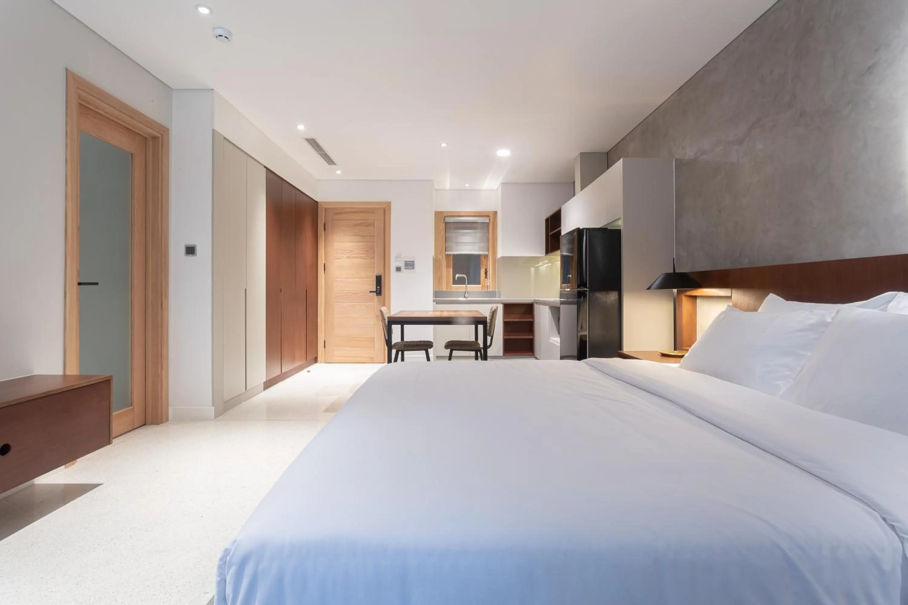 Bed in Bi Eco Suites Hanoi