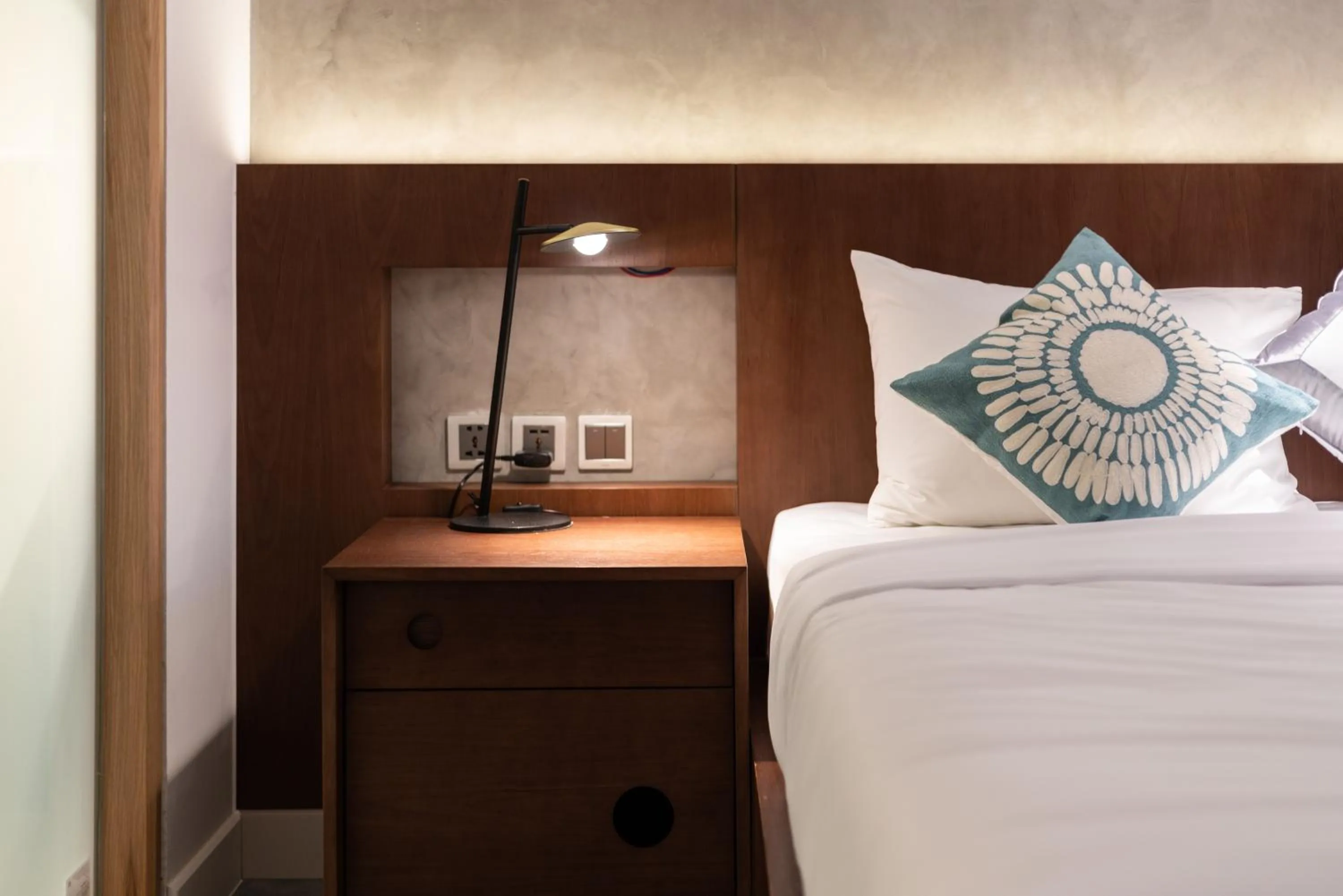 Bed in Bi Eco Suites Hanoi