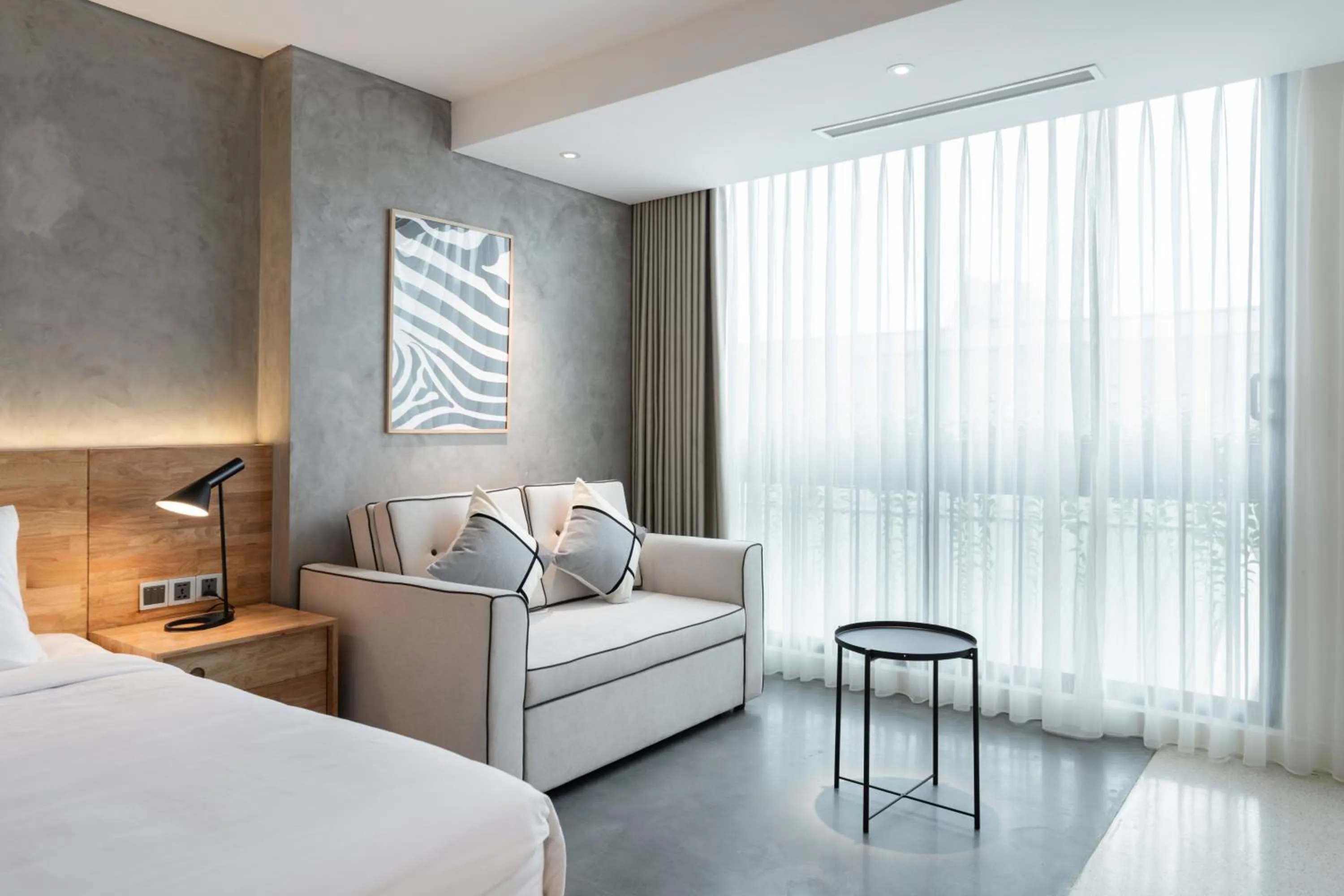 Bed in Bi Eco Suites Hanoi