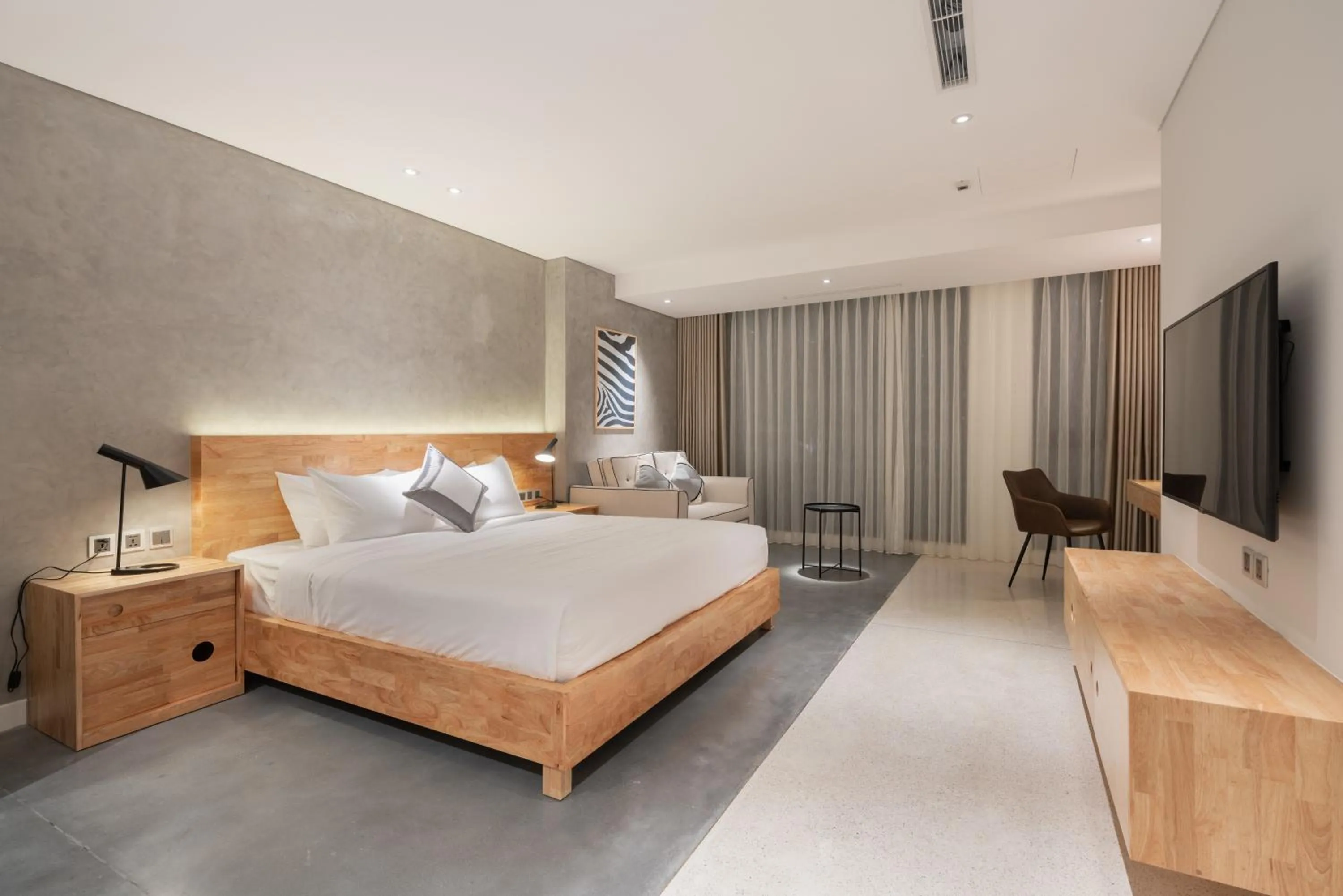 Bed in Bi Eco Suites Hanoi