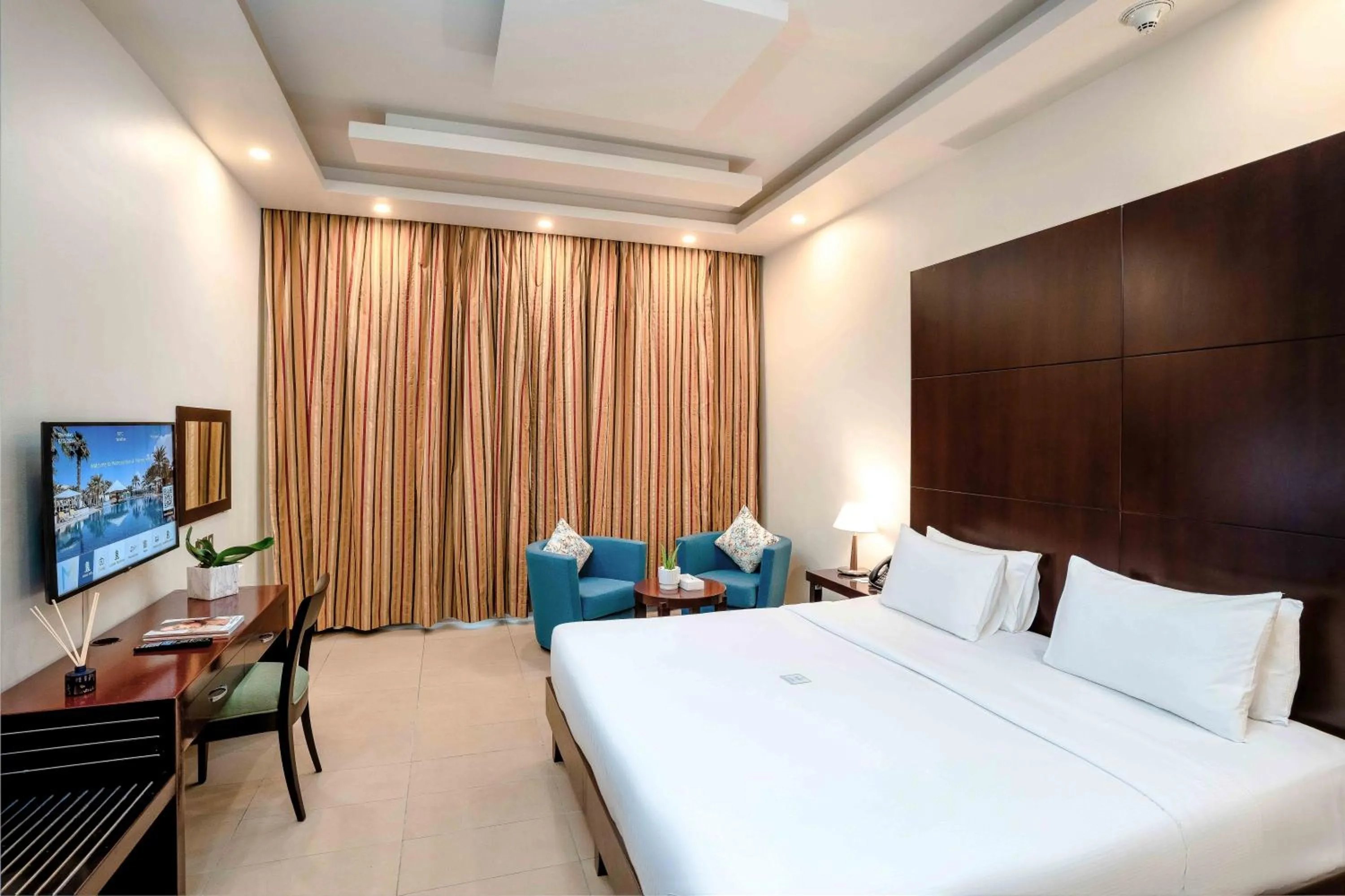 Studio Room with One King Bed - single occupancy in Metropolitan Al Mafraq Hotel