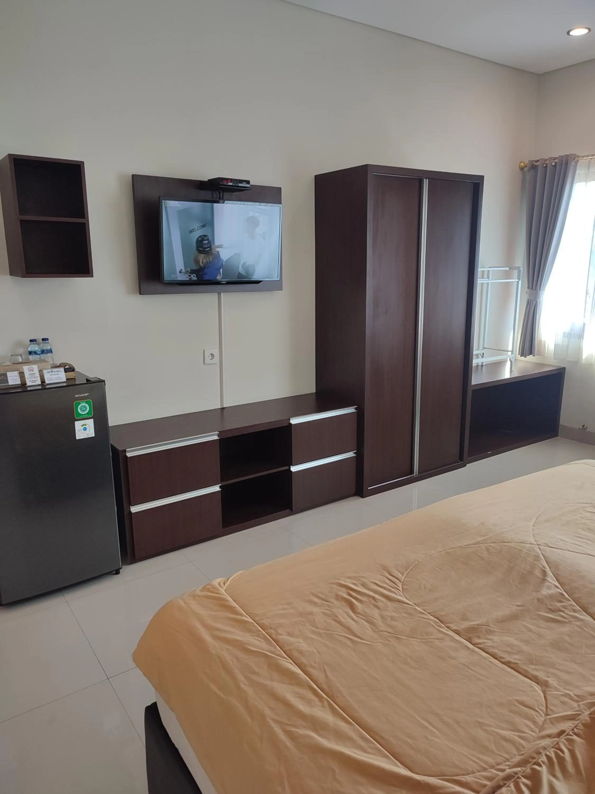 Communal lounge/ TV room, Bed in Kubu Di-Kayla's