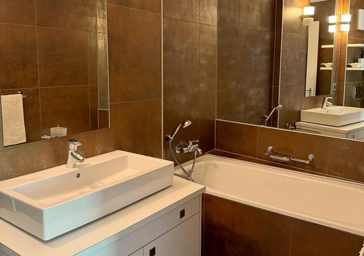 Bathroom in Hôtel des Bains de Saillon