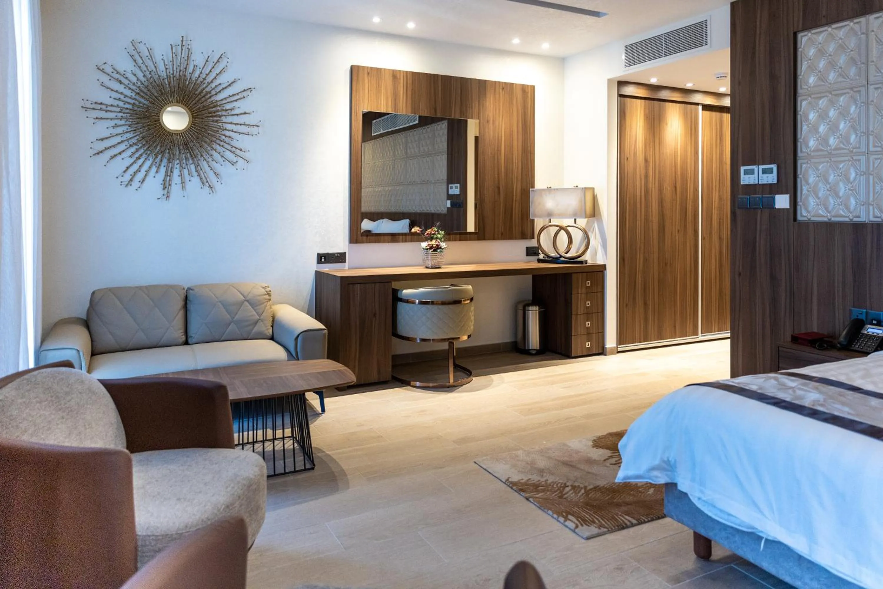 Seating area, Bed in Leonardo Boutique Hotel Larnaca