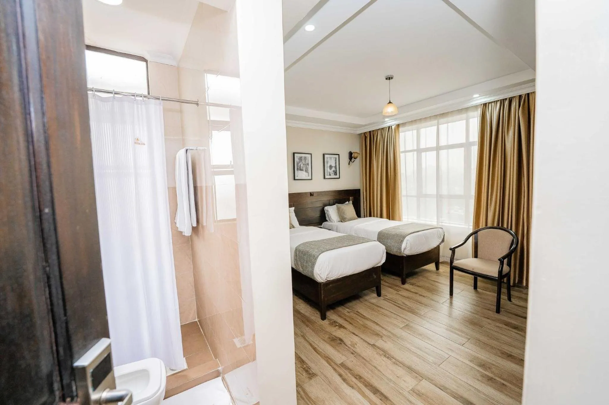 Bedroom, Seating Area in Hemak Suites