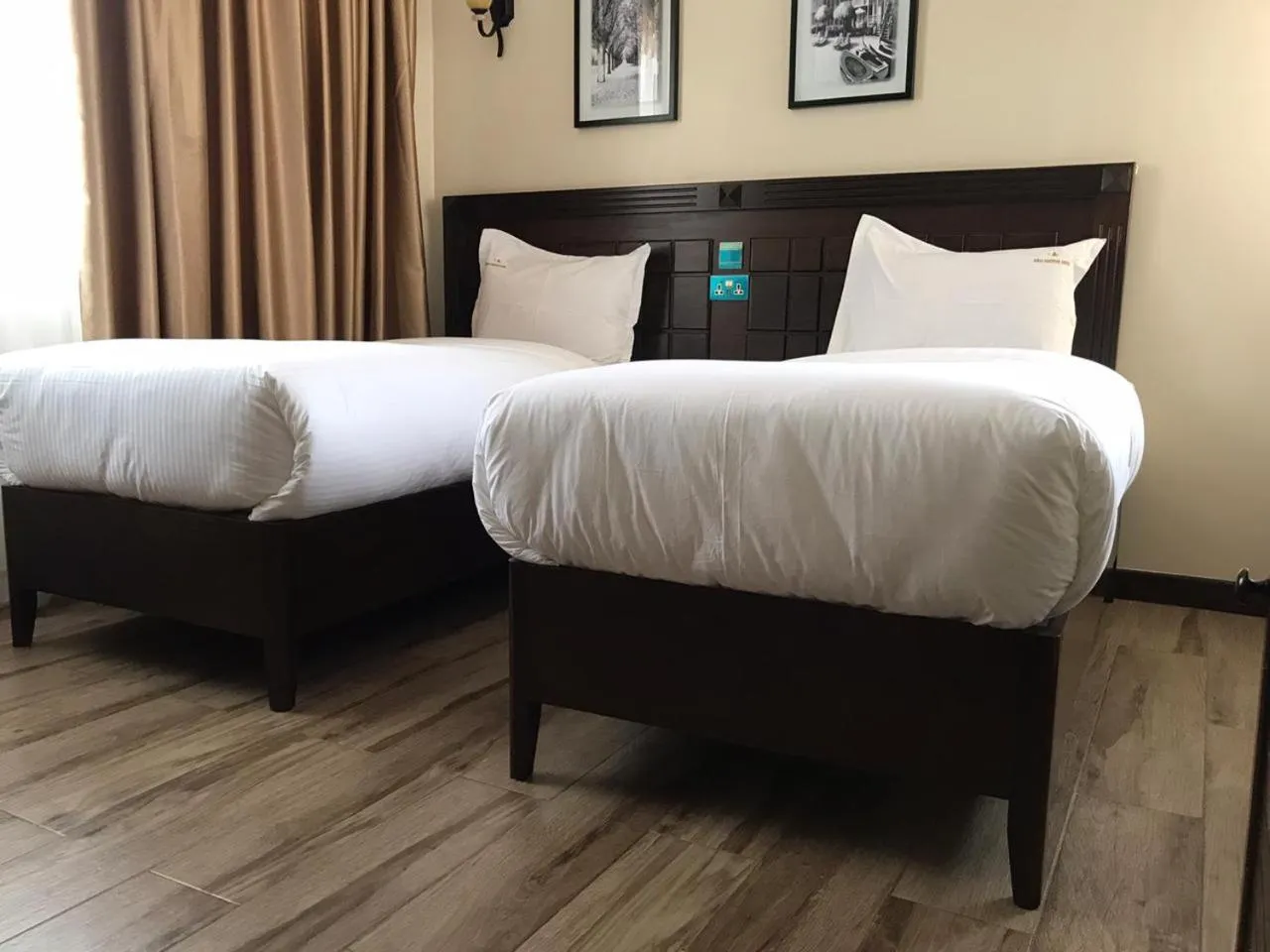Bed in Hemak Suites