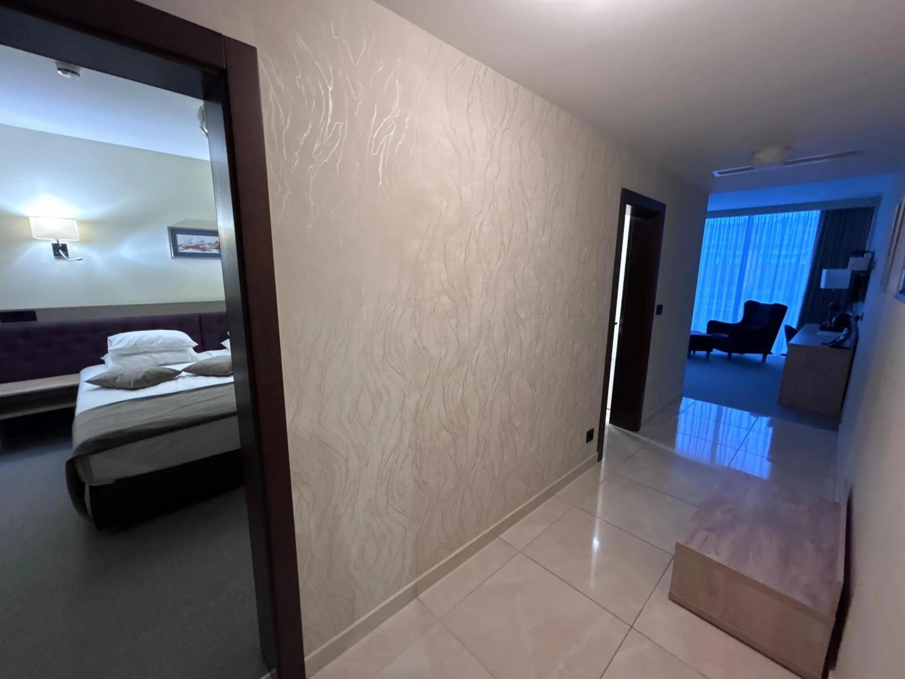 Living room, Bed in Hotel Siesta