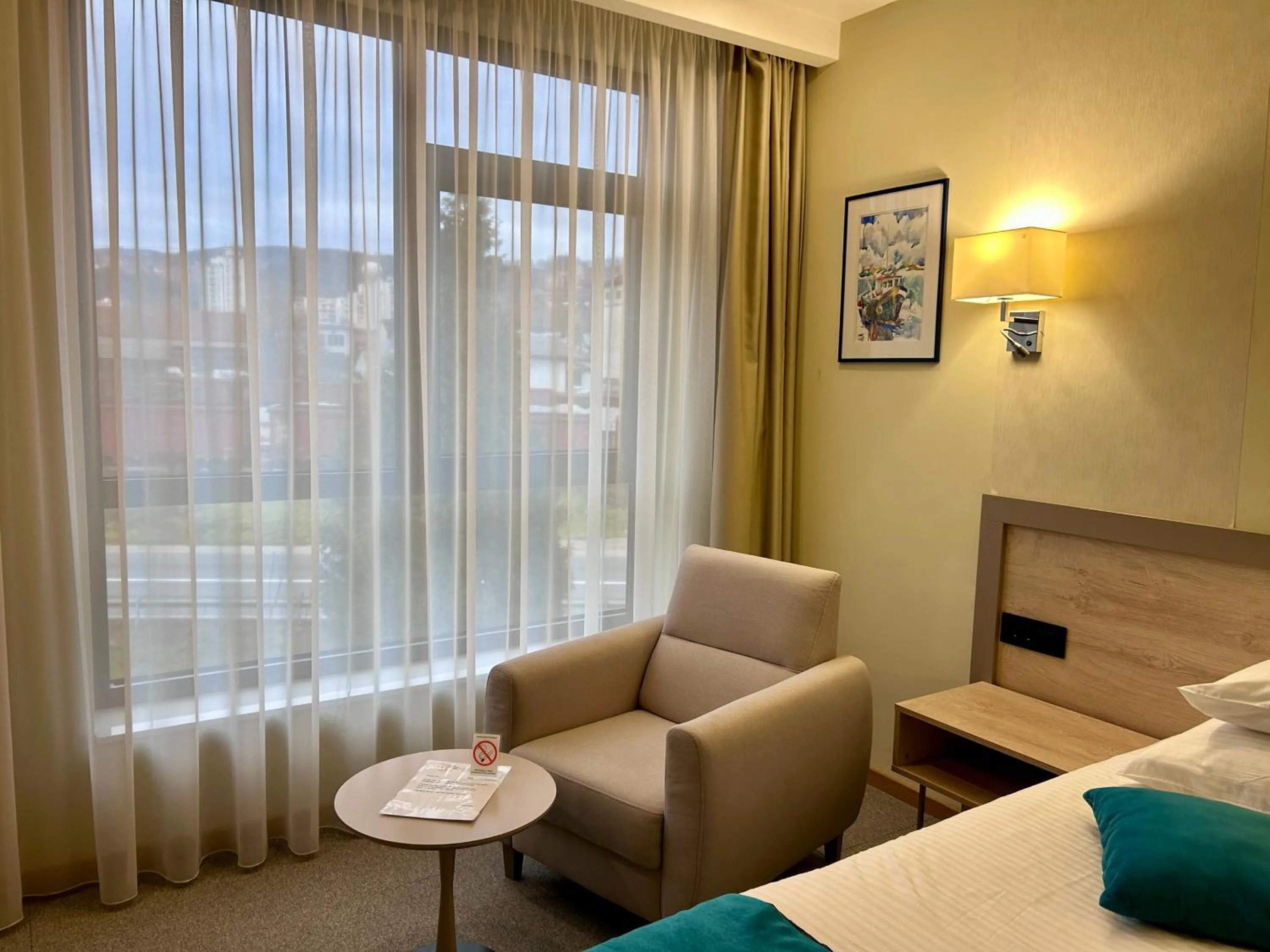 Living room, Bed in Hotel Siesta