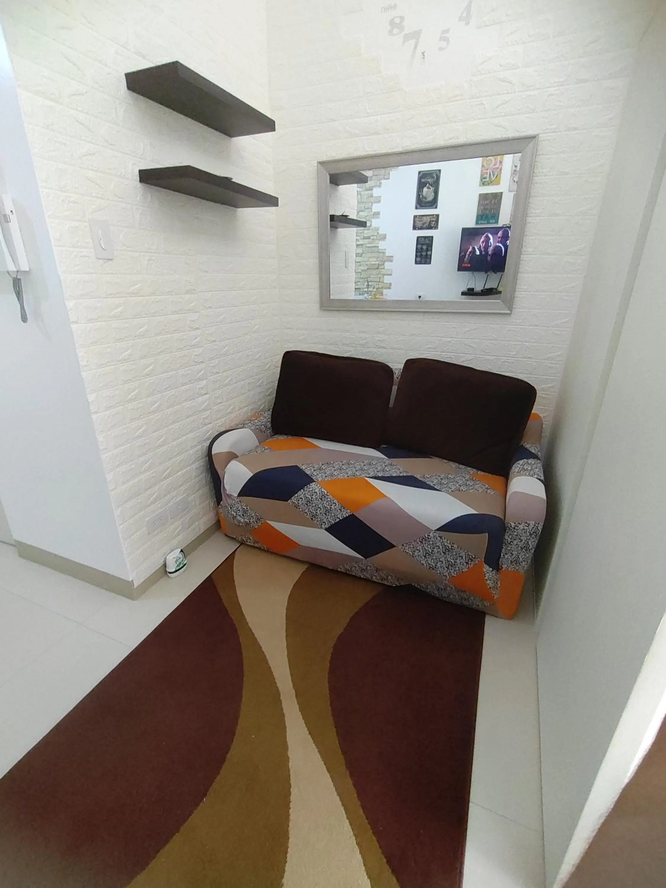 Living room in R&A Staycation at Wind Residence