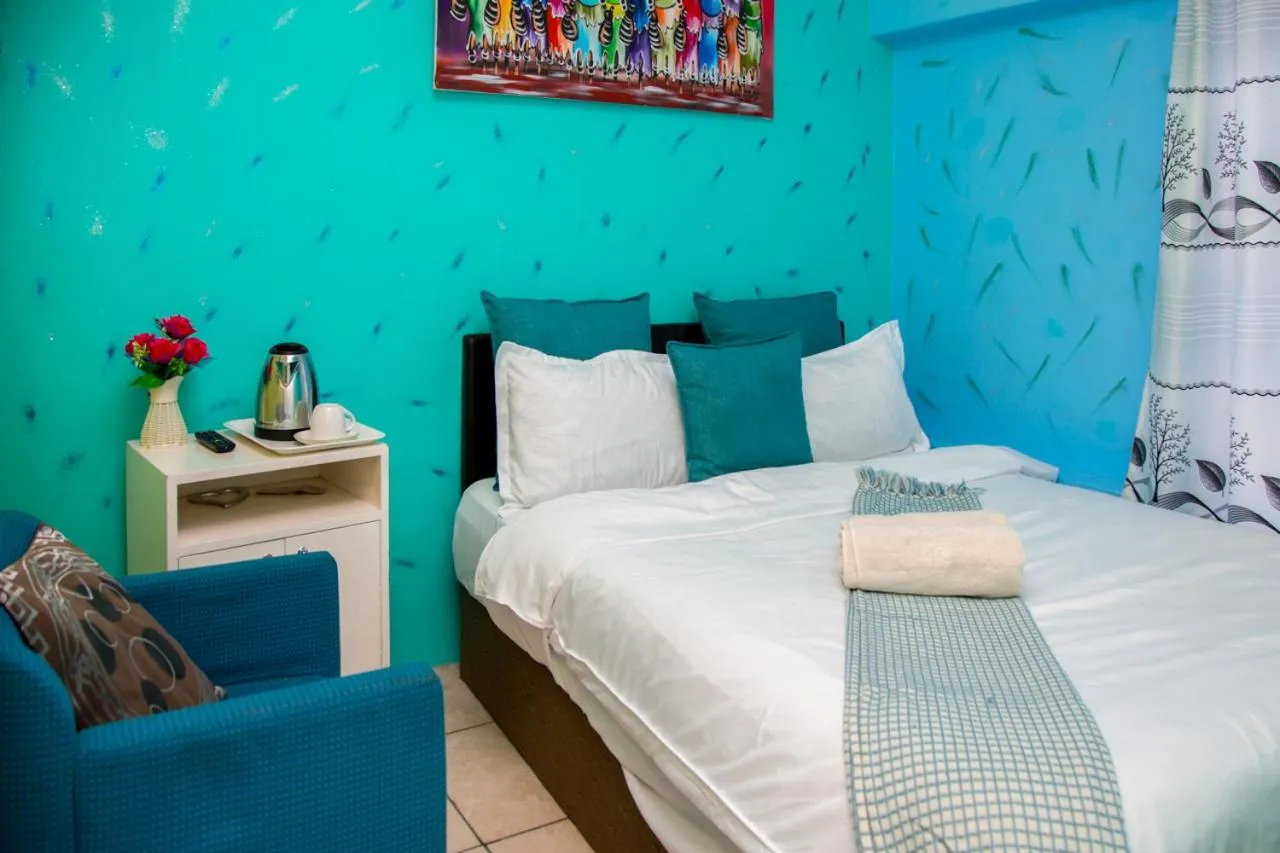 Bed in Relaxing Guest House in th Heart of Ndabeni