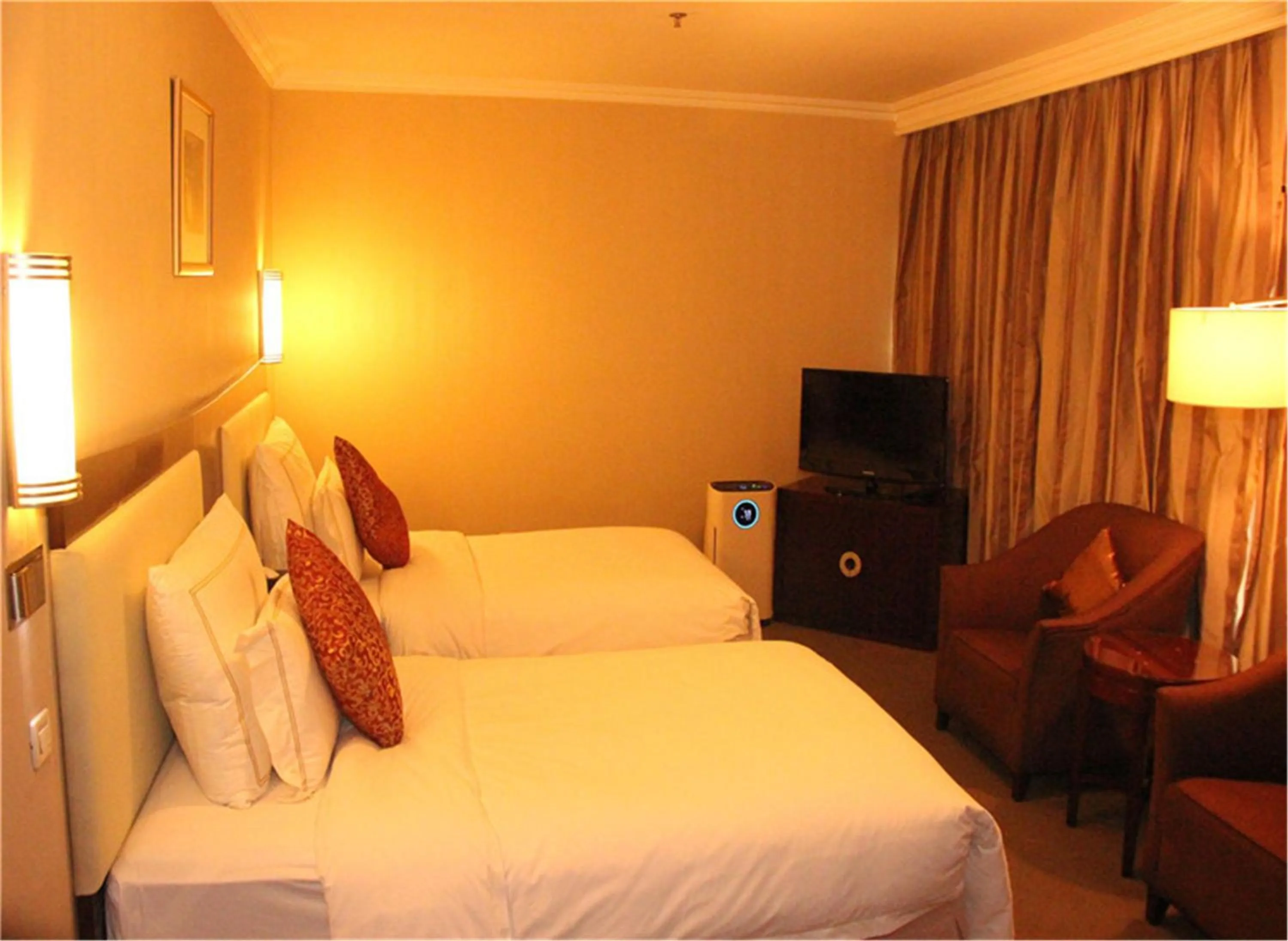 Bedroom in Jinjiang Fuyuan Hotel