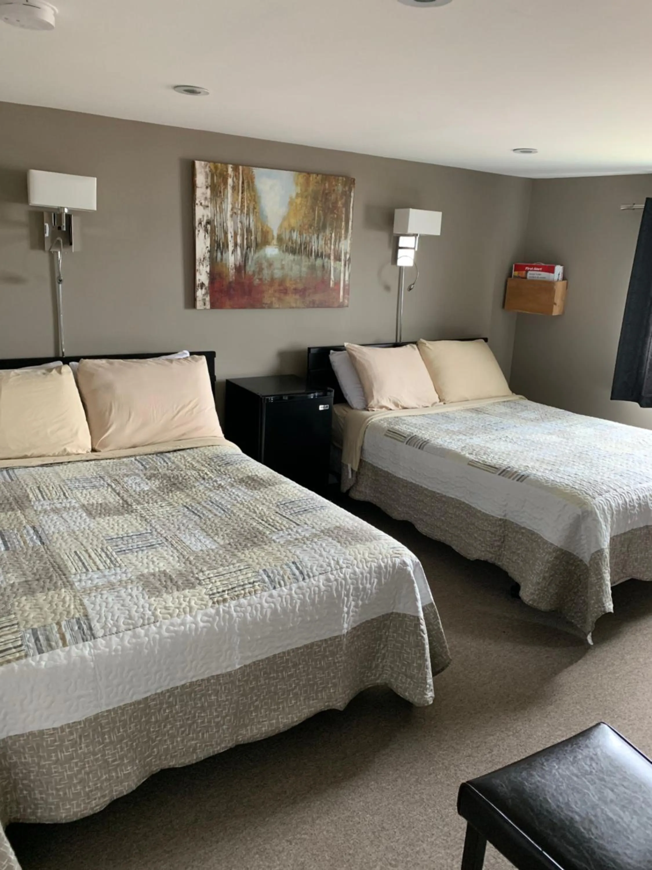 Bed in Exploits Inn and Suites