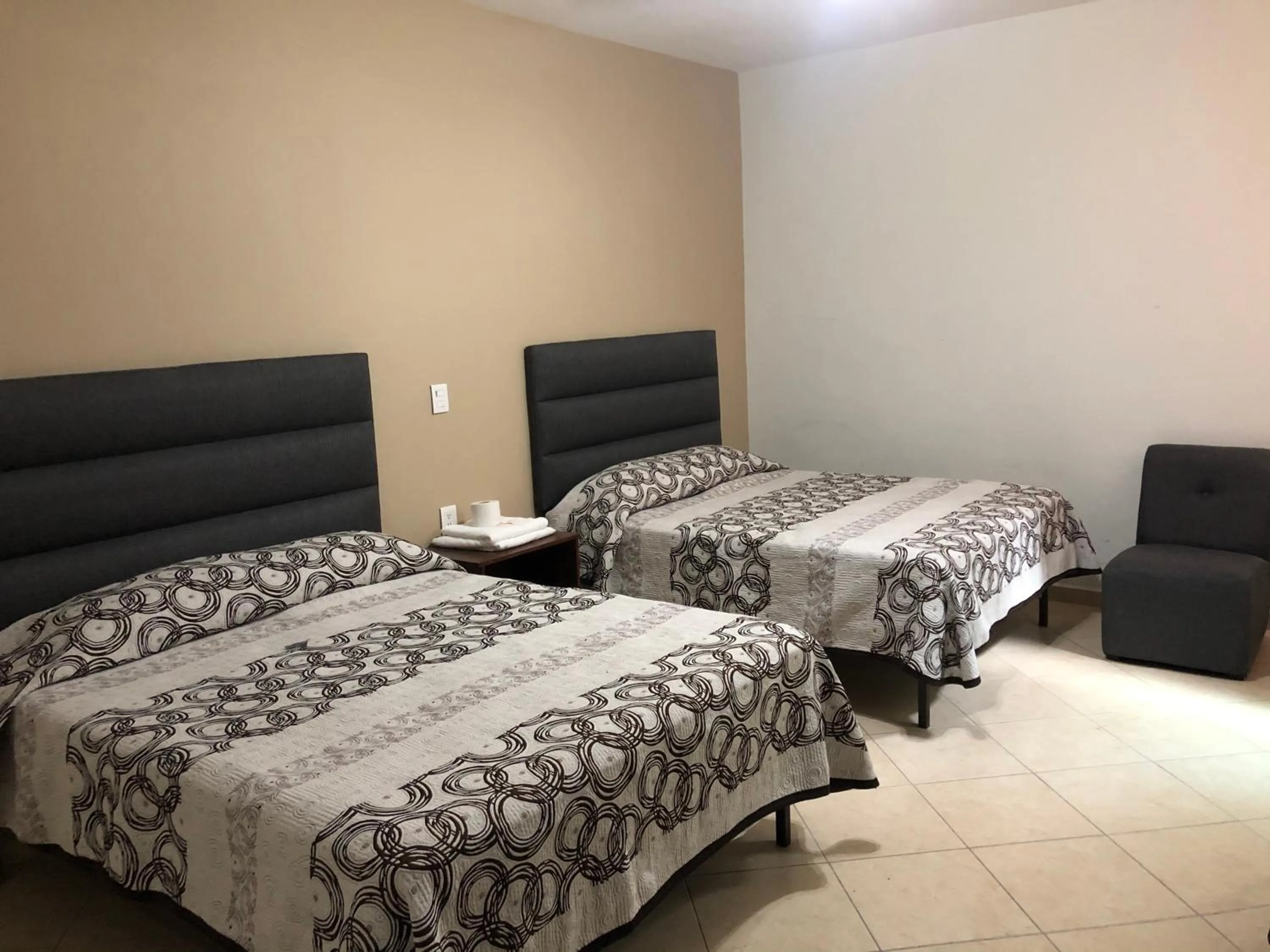 Bed in Hotel Posada Ruiseñor